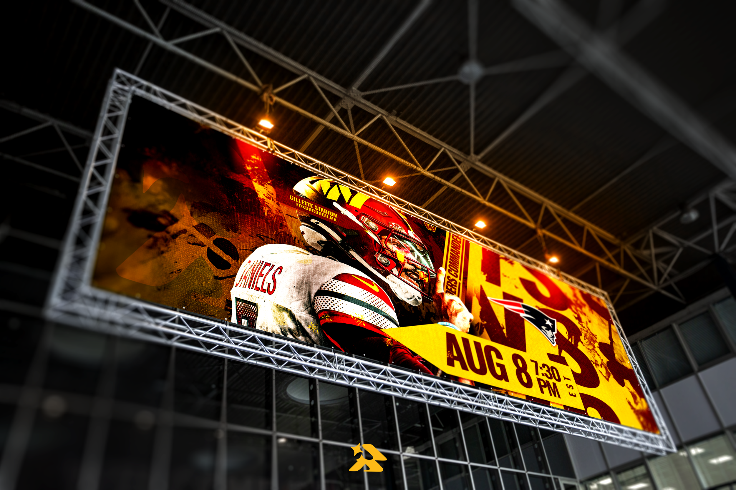 Large promotional banner hanging inside a stadium, advertising a racing event on August 8th at 7:30 PM, featuring a race car driver in a helmet and racing gear.