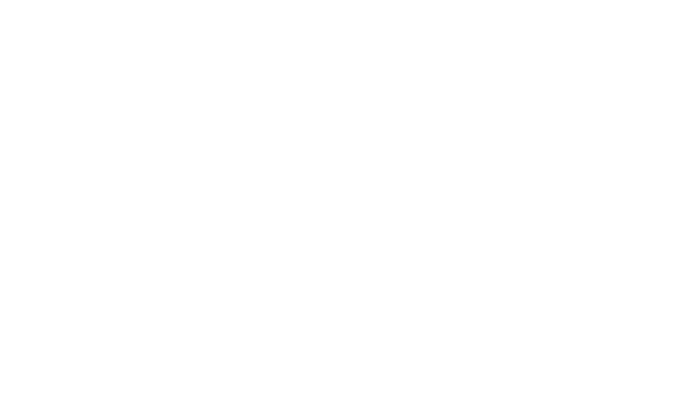 Firma manuscrita de Carlota Alvarado en estilo cursivo moderno, en color blanco sobre fondo negro.