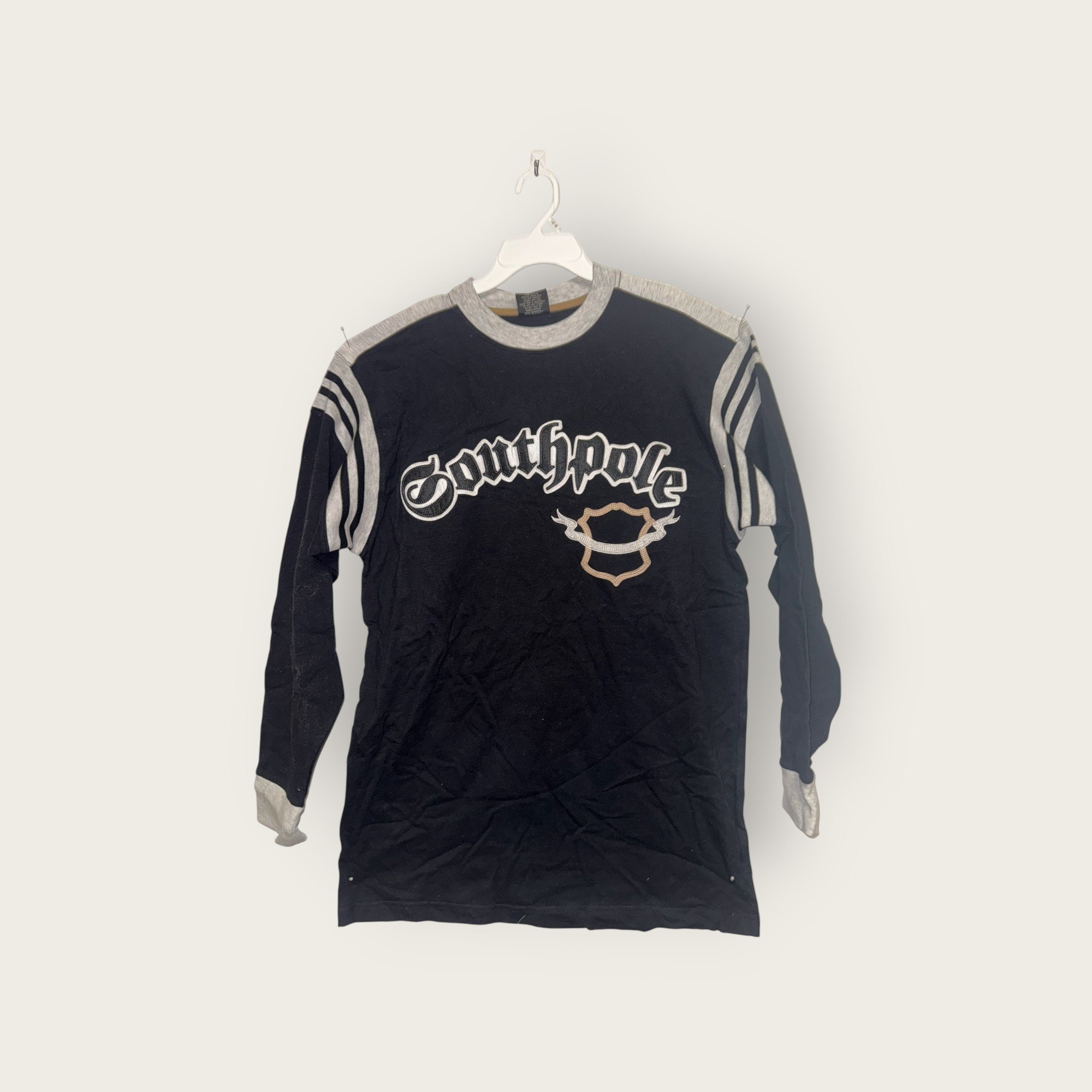 Southpole Black Light Brown Emblem.jpg
