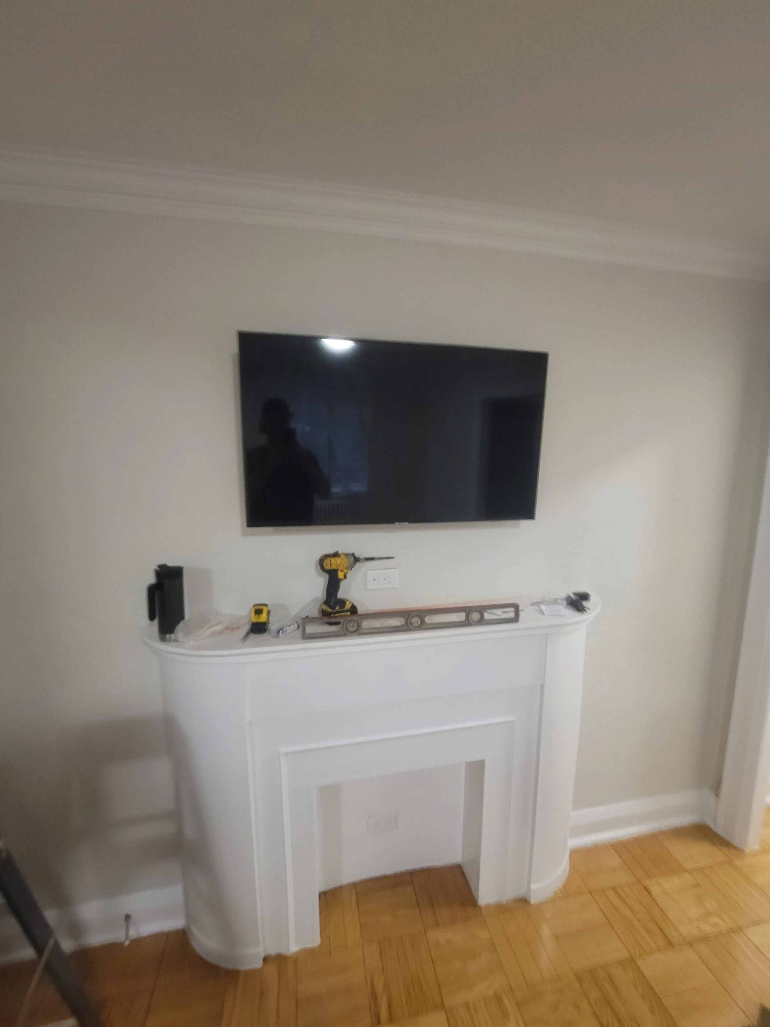 mount tv above fireplace