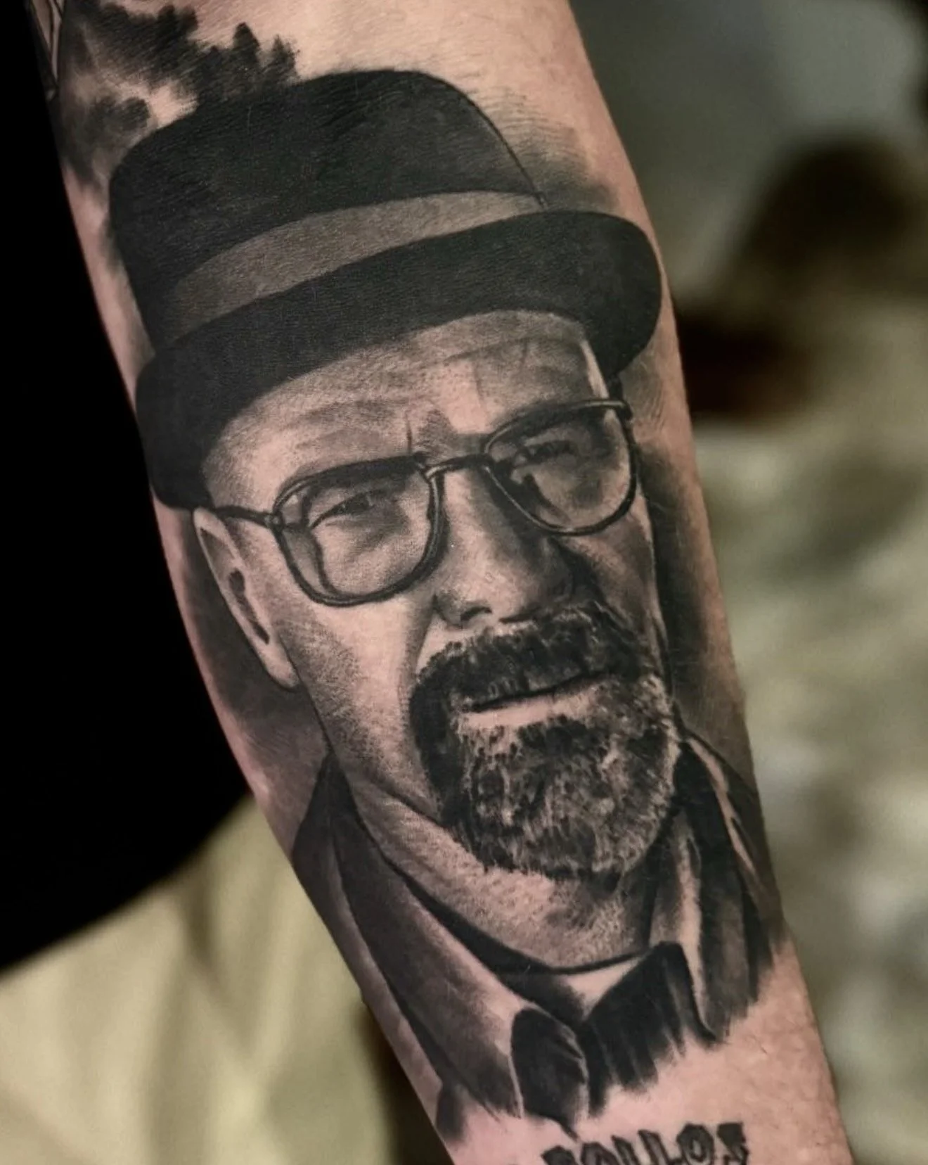 Detailed black and grey arm tattoo of a Walter White, portrait inspired by the television series Breaking Bad, done by Cody Eckenrode at CREate Tattoo Studio.