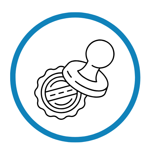 A rubber stamp pressing onto a wax seal with a circular design.