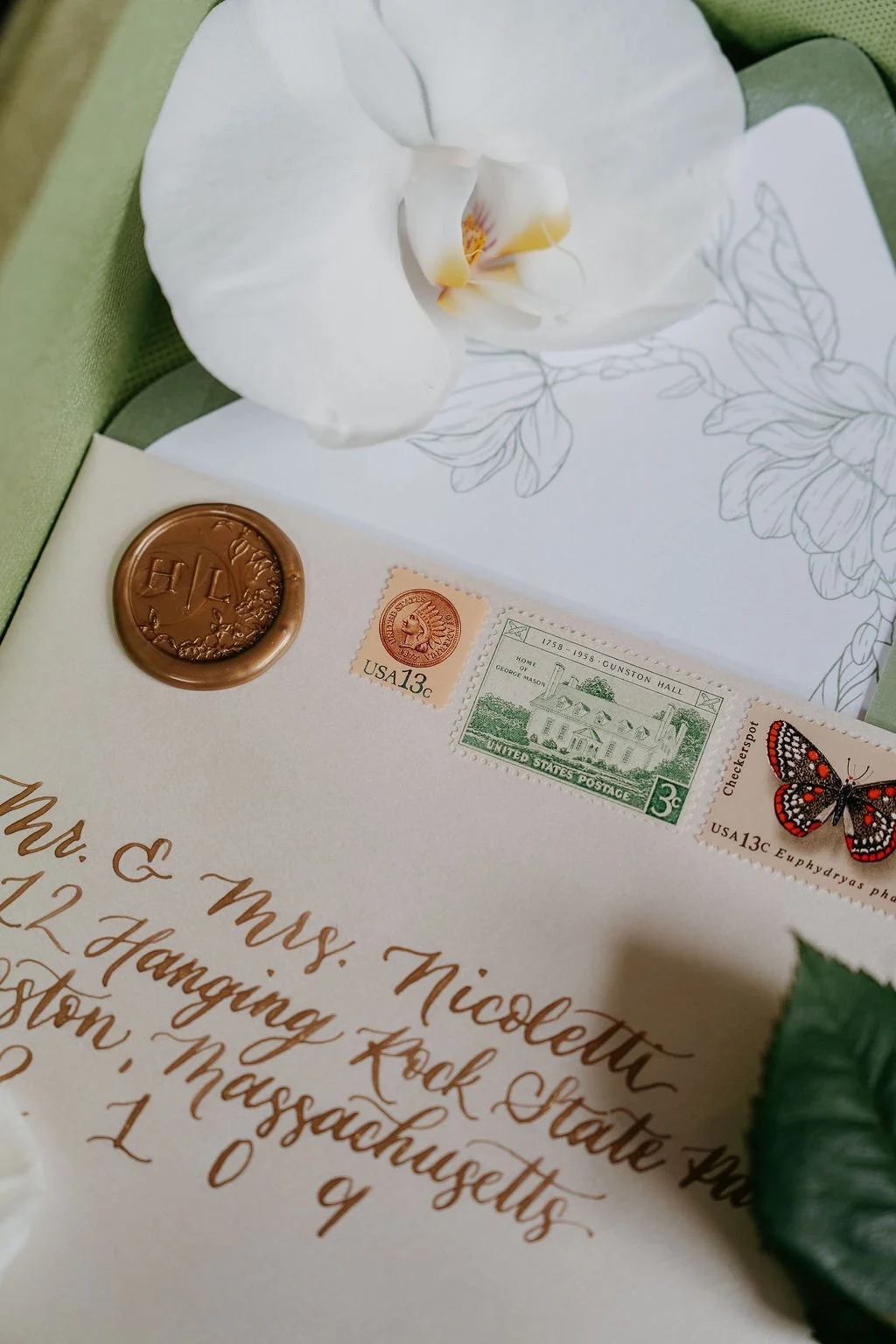 Custom bespoke wedding invitation suite with hand-lettered calligraphy and vintage stamps for a Boston wedding.