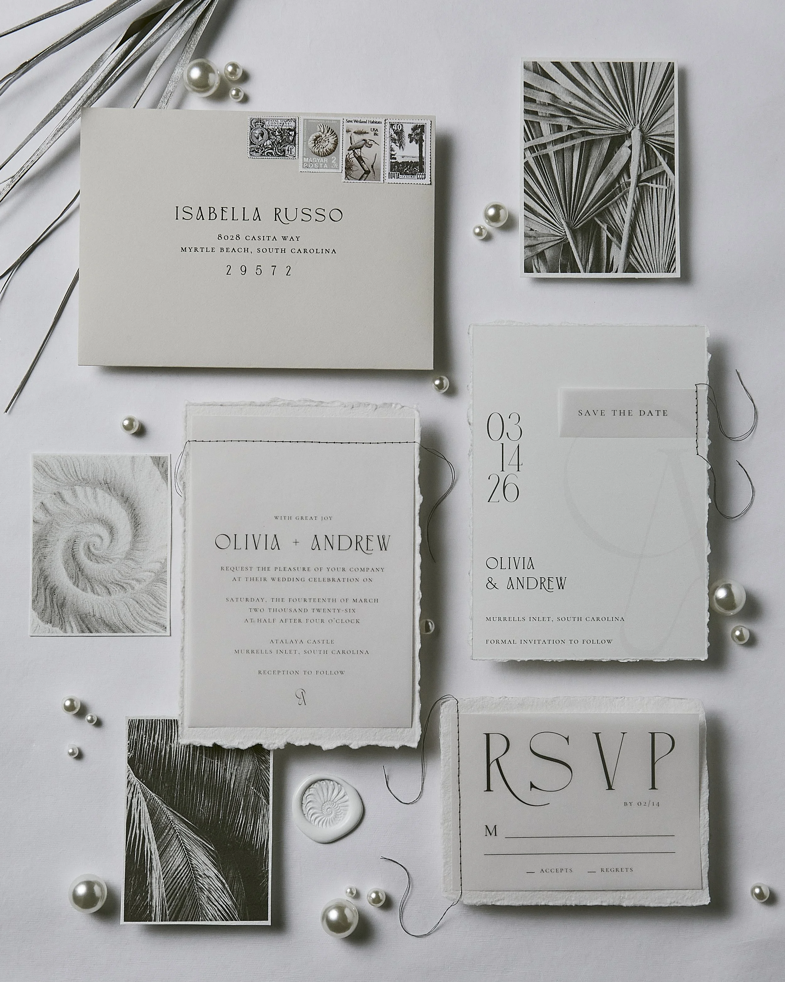 Elegant, beachy custom charcoal neutral invitation suite at Atalaya Castle South Carolina
