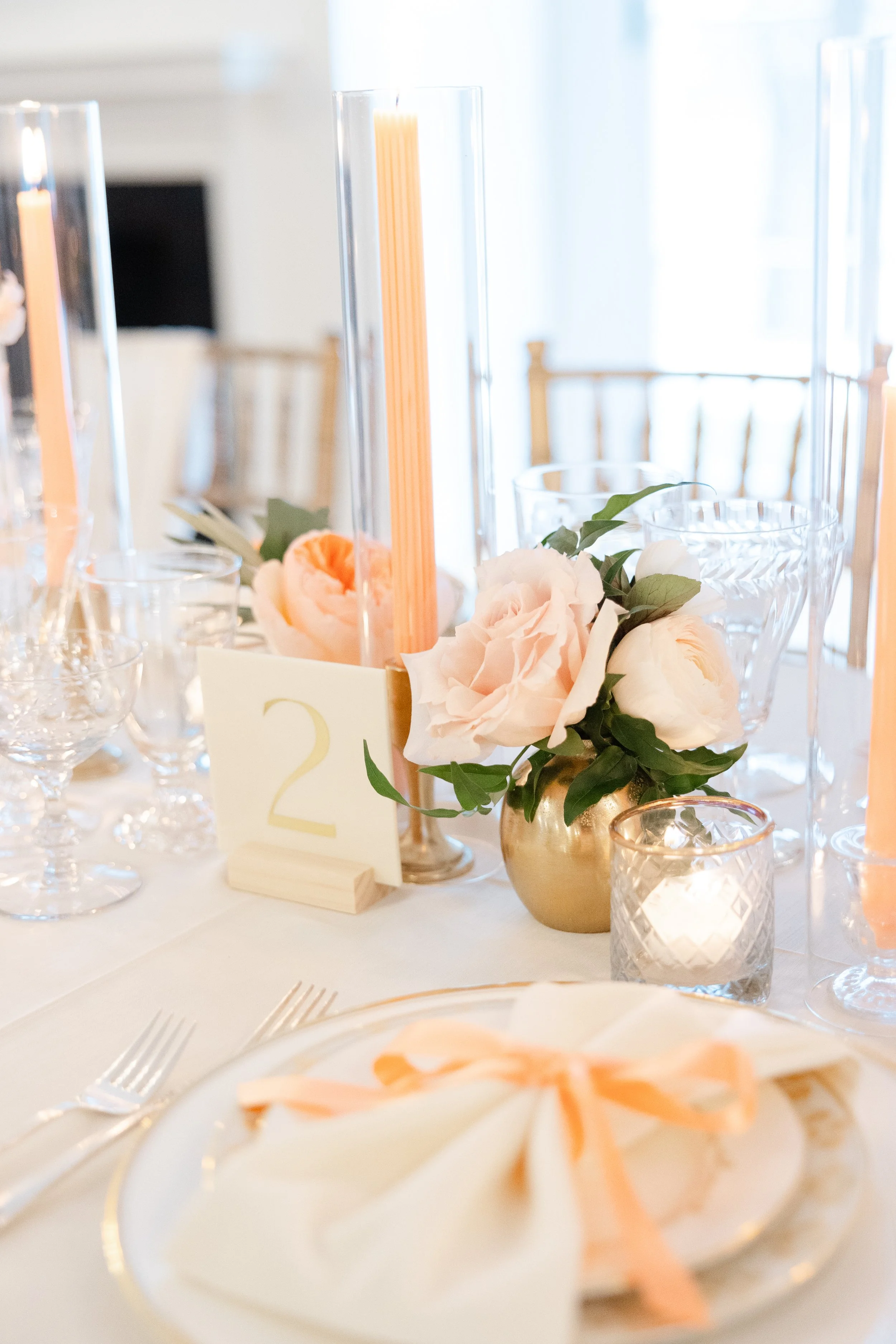Custom modern elegant cream acrylic table number with gold vinyl lettering for a peach and pink wedding at Floriana in Ipswich, MA