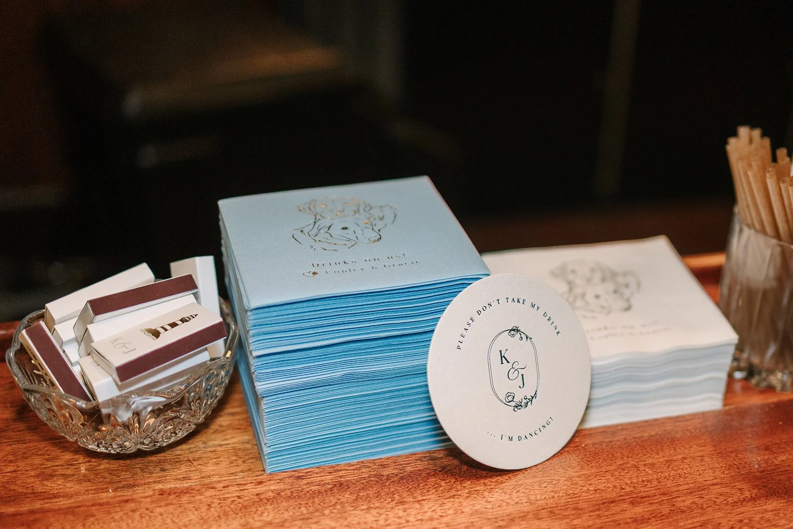 Custom pet cocktail napkins with lighthouse matchboxes and drink coasters for a wedding at the Nantucket Hotel & Resort in Nantucket, MA