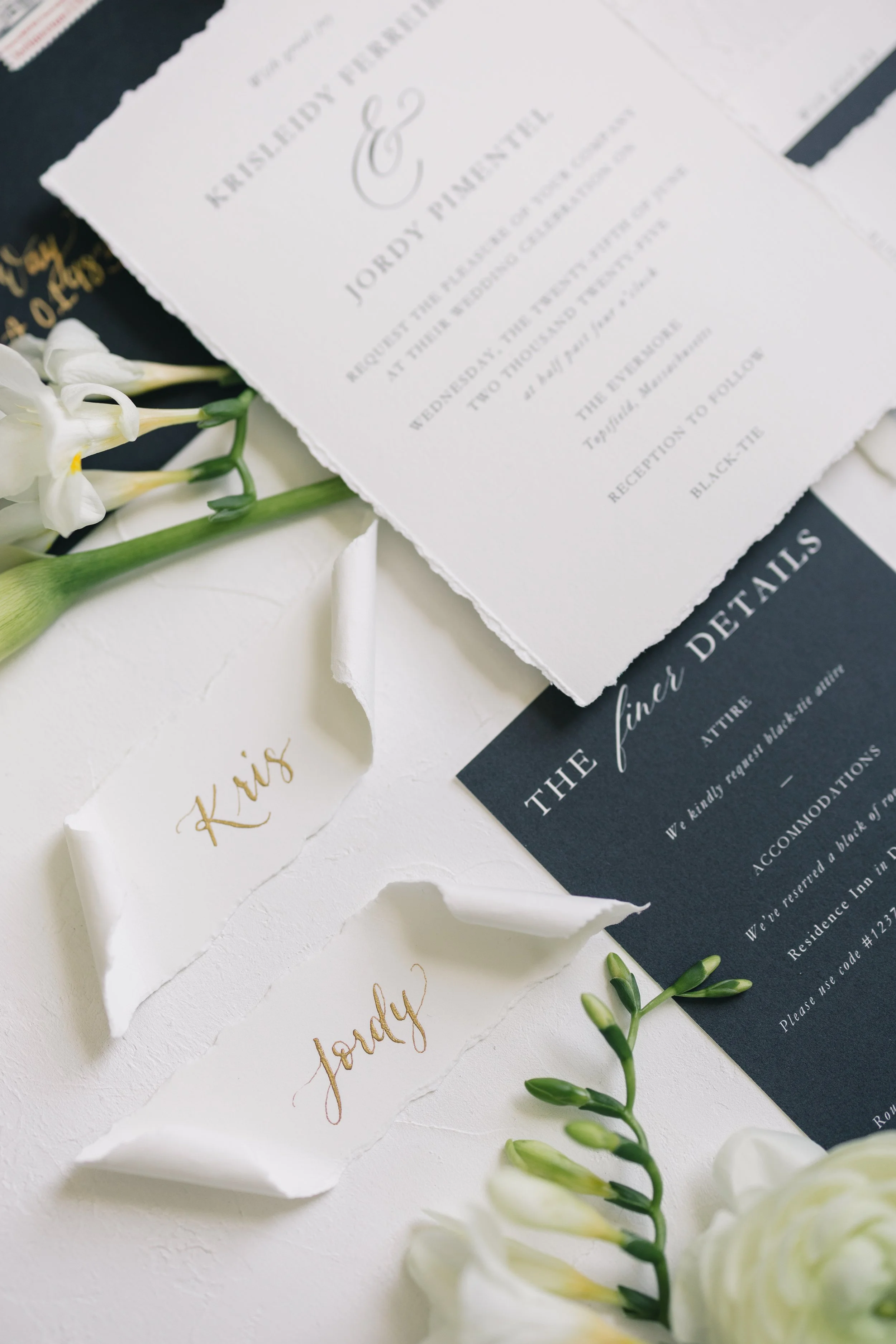 Bespoke deckled-edge cotton wedding place cards with gold calligraphy - The Evermore