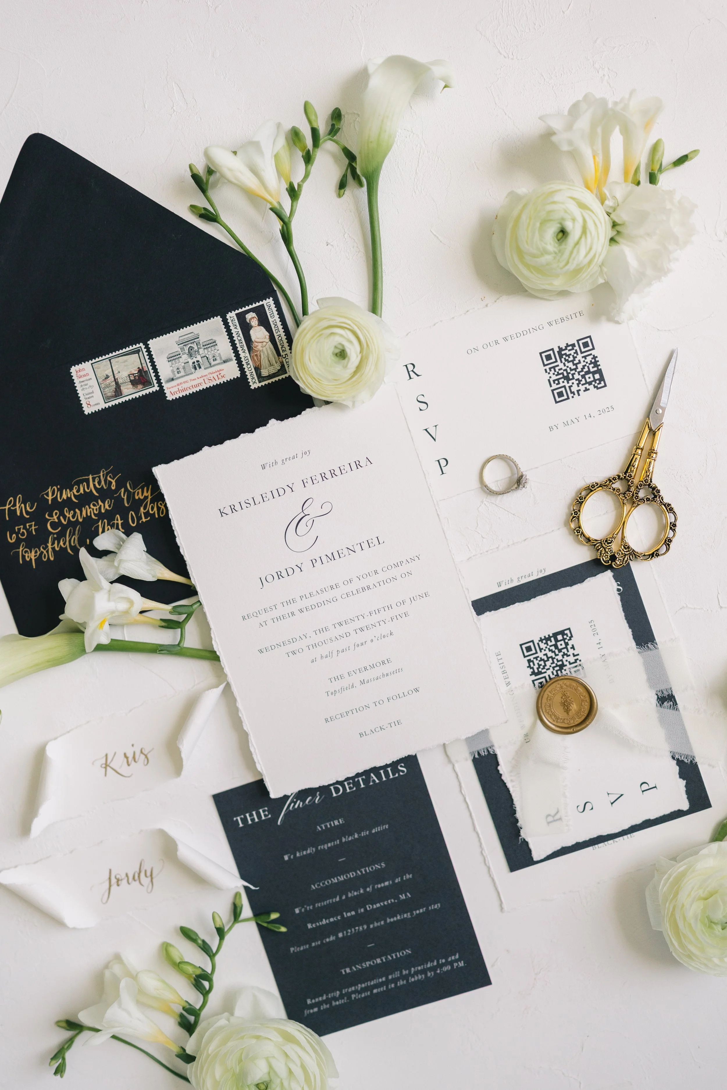 Black and white wedding invitation suite with deckled ending, antique gold wax seal, and vintage stamps