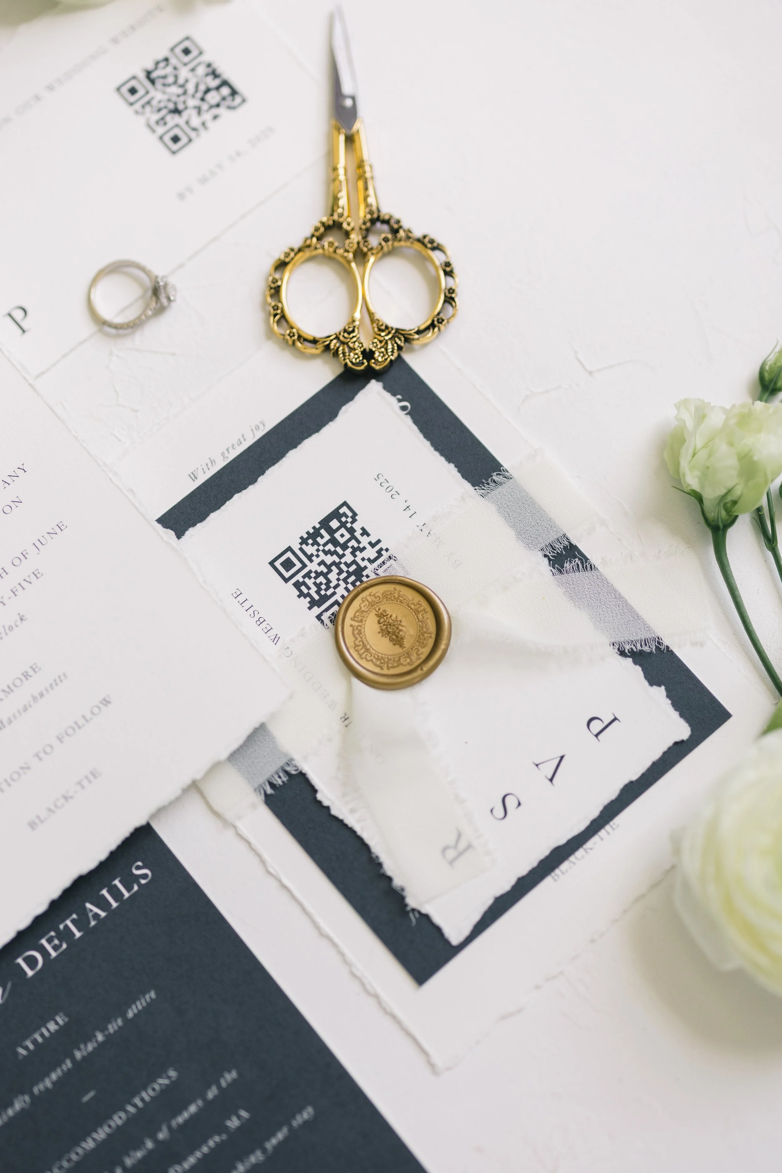 Bespoke deckled-edge cotton wedding invitation suite with vintage stamps, calligraphy, and gold wax seal - The Evermore