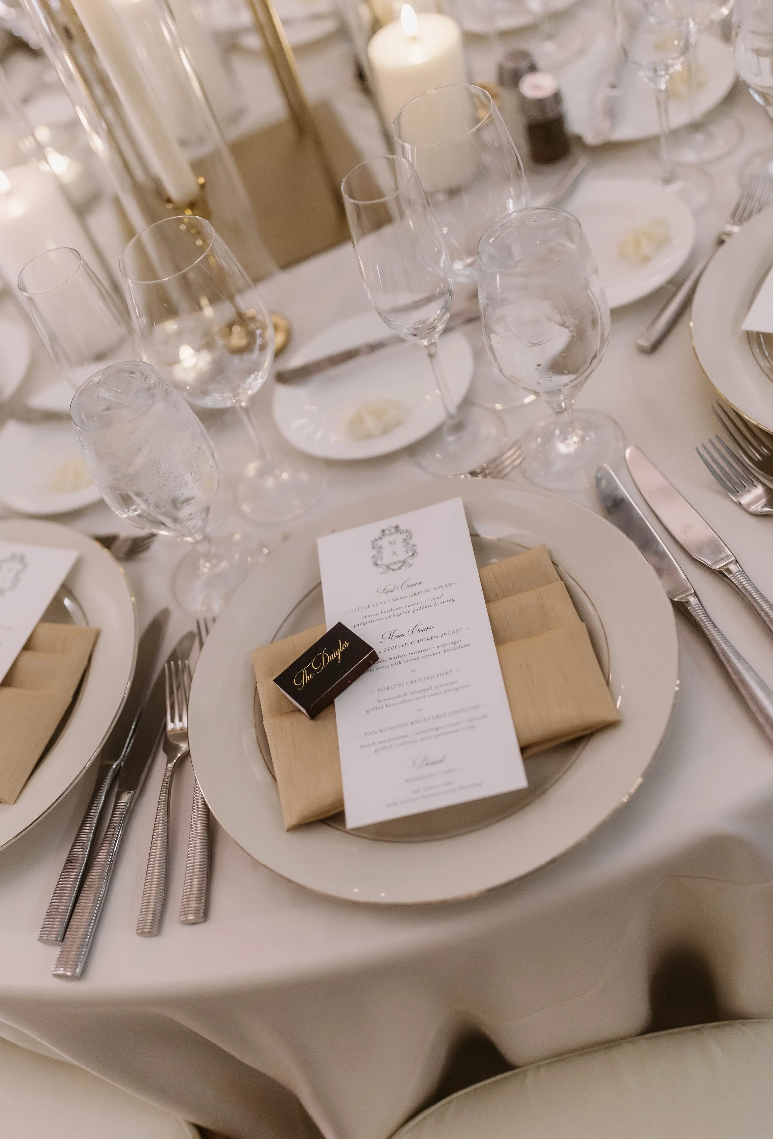gold, white and black wedding dinner menus and custom matchboxes at the fairmont copley plaza