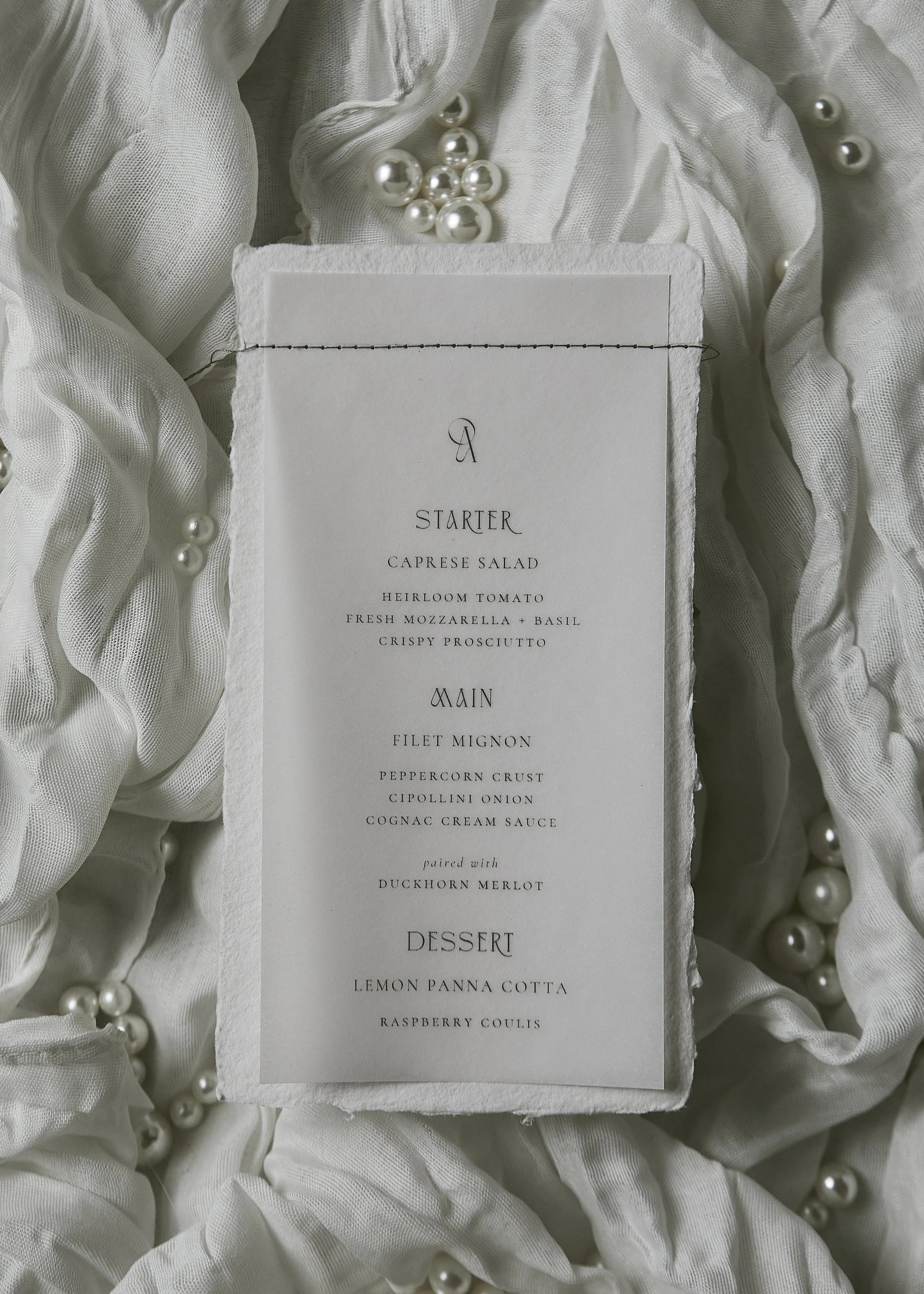 Elegant, beachy custom charcoal neutral sewn dinner menus at Atalaya Castle South Carolina