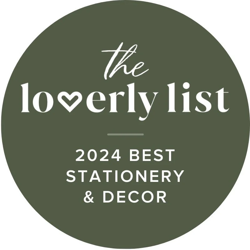 Dark green logo featuring white text that reads the Loverly List 2024 BEST STATIONERY & DECOR