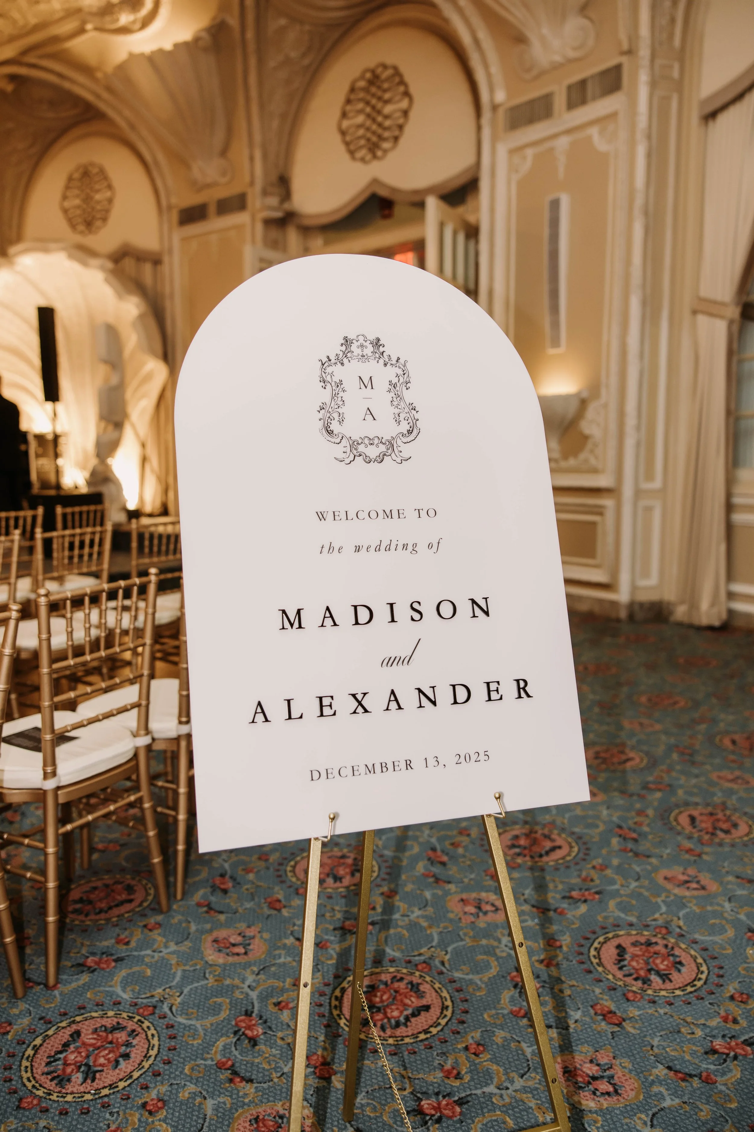 white and black arch acrylic wedding welcome sign at the fairmont copley plaza