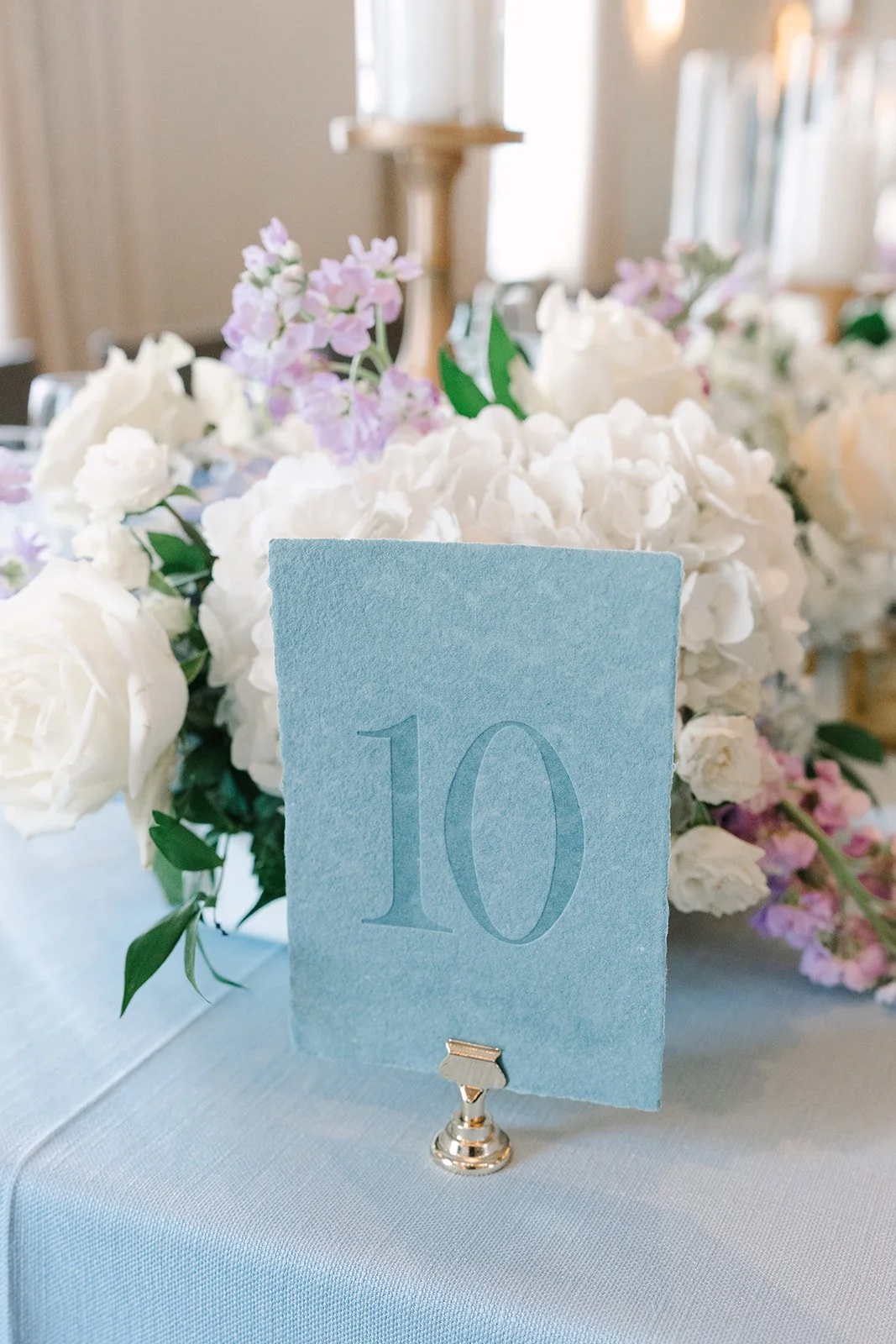 Letterpress deckled edge, dusty blue handmade paper table numbers for a wedding at the Nantucket Hotel & Resort in Nantucket, MA