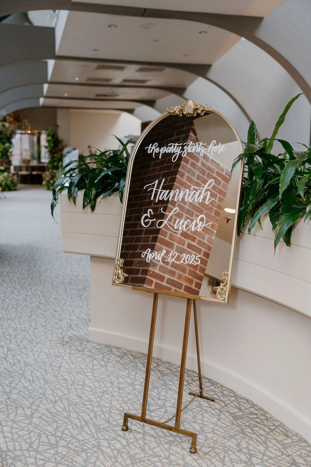 Vintage ornate gold mirror wedding welcome sign featuring white hand-lettered calligraphy - Bostonian Hotel