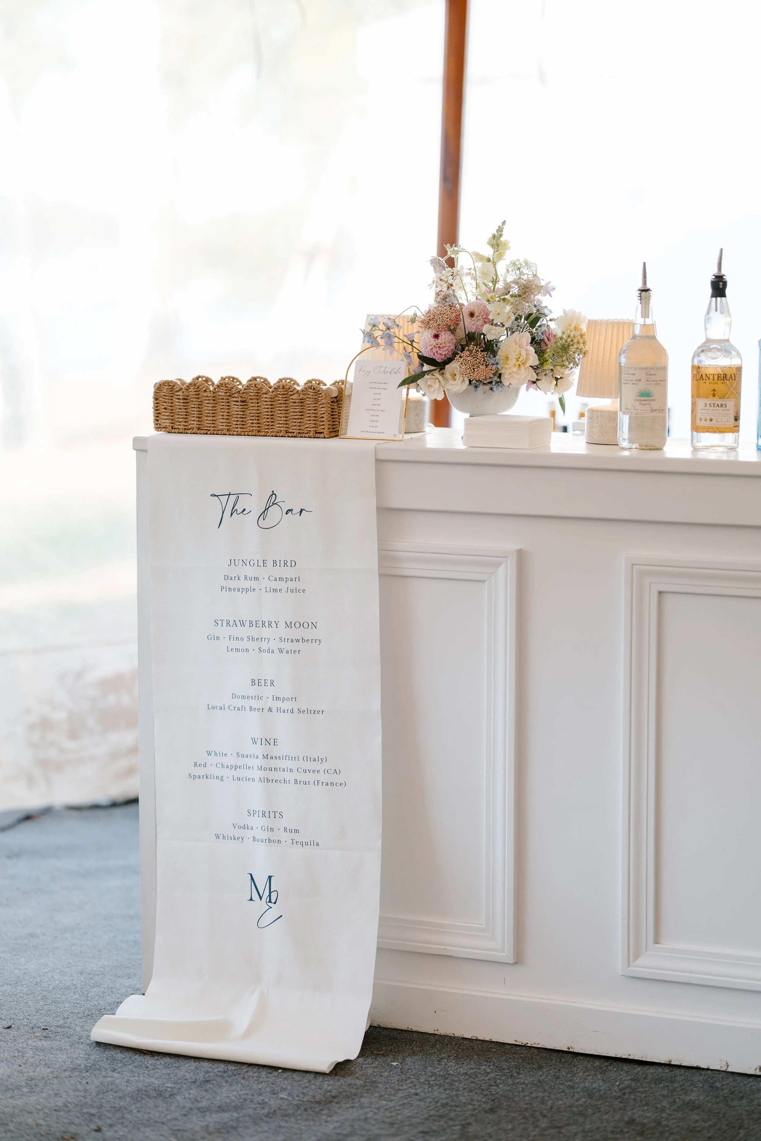 Linen fabric wedding signature cocktail bar sign with navy ink for a coastal wedding at the Inn at Diamond Cove
