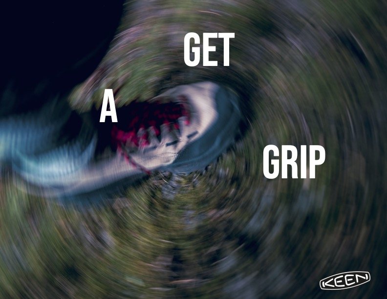 A large fish, possibly a pike, with sharp teeth and blue-gray coloring, in water with a motion blur effect. Overlaid text reads 'GET A GRIP'.