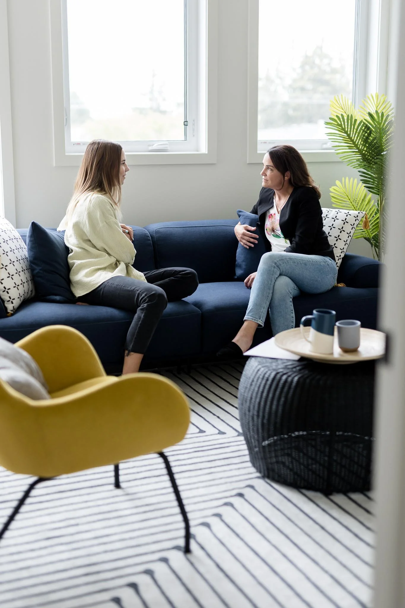 Teen and parent in a supportive conversation during depression therapy at Ten Child Psychology in Calgary
