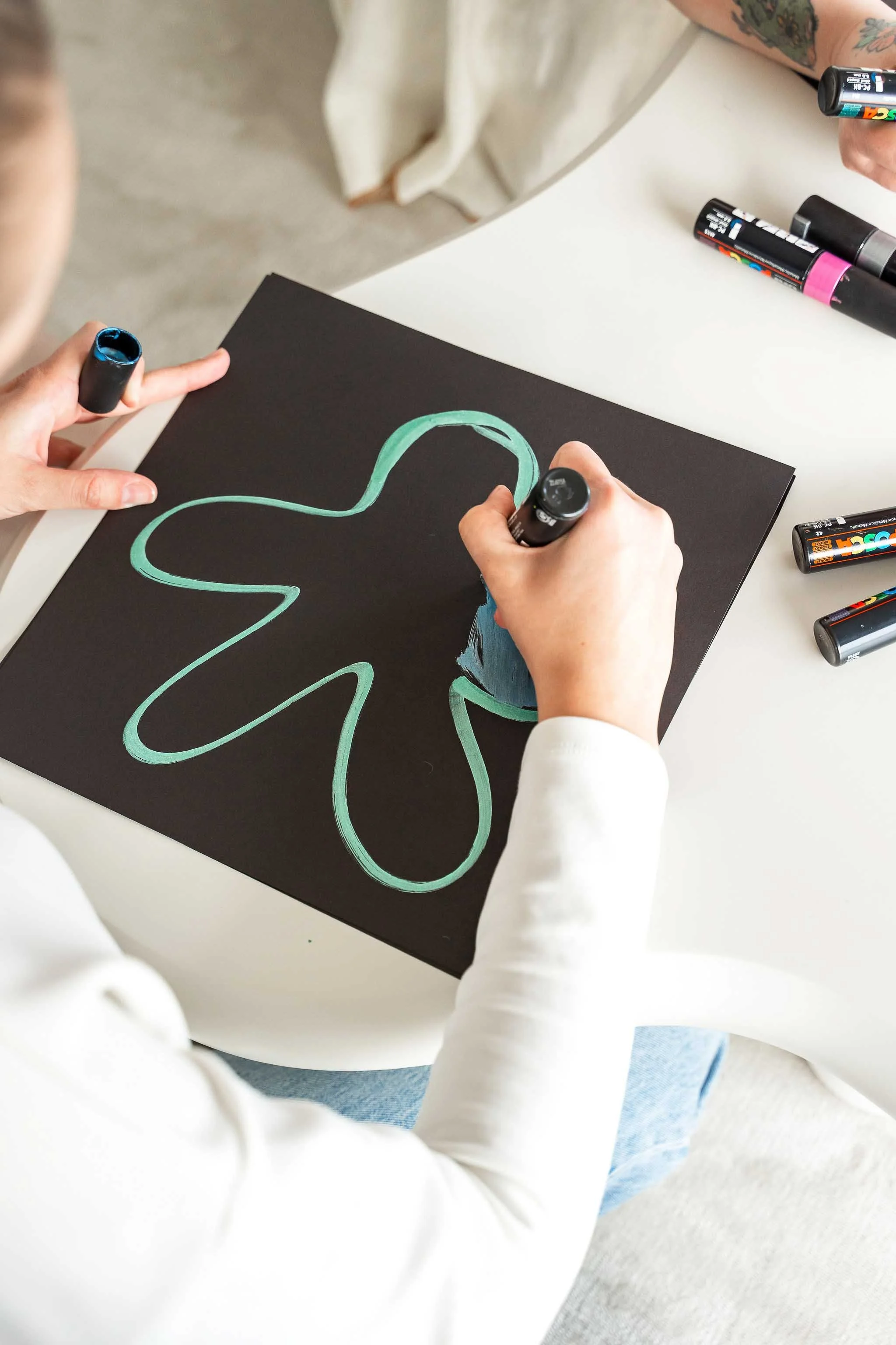 Child expressing emotions through art during social anxiety therapy at Ten Child Psychology in Calgary