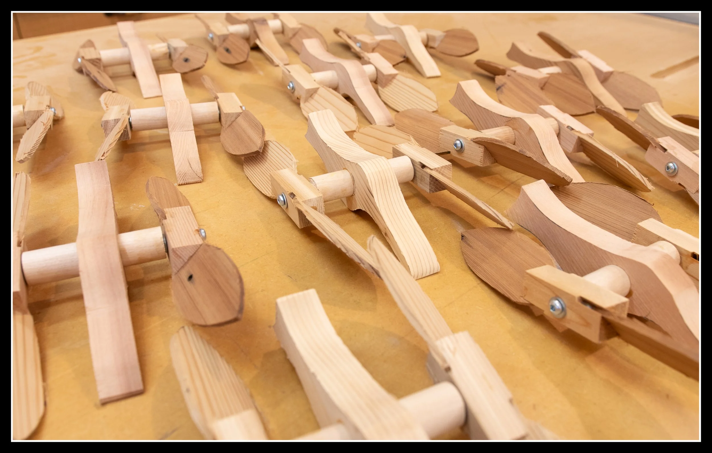 Cedar Whirly Birds on a workbench