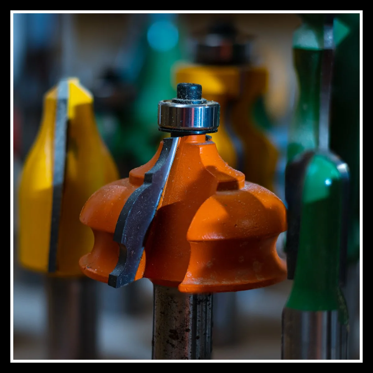 Close‑up of router bits symbolizing the creative possibilities of woodworking and the feeling that photography can capture anything worth seeing.