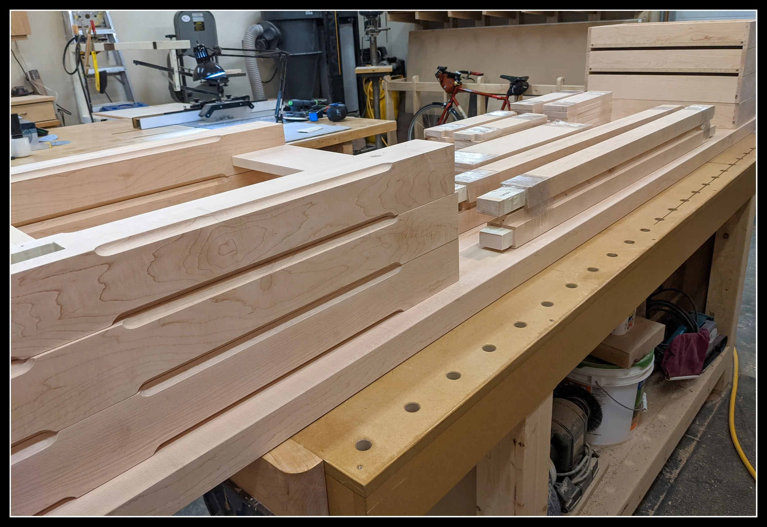 Woodworking project in progress with milled boards and routed joinery in Knotty Dave’s shop, showing the world he’s building through craft.