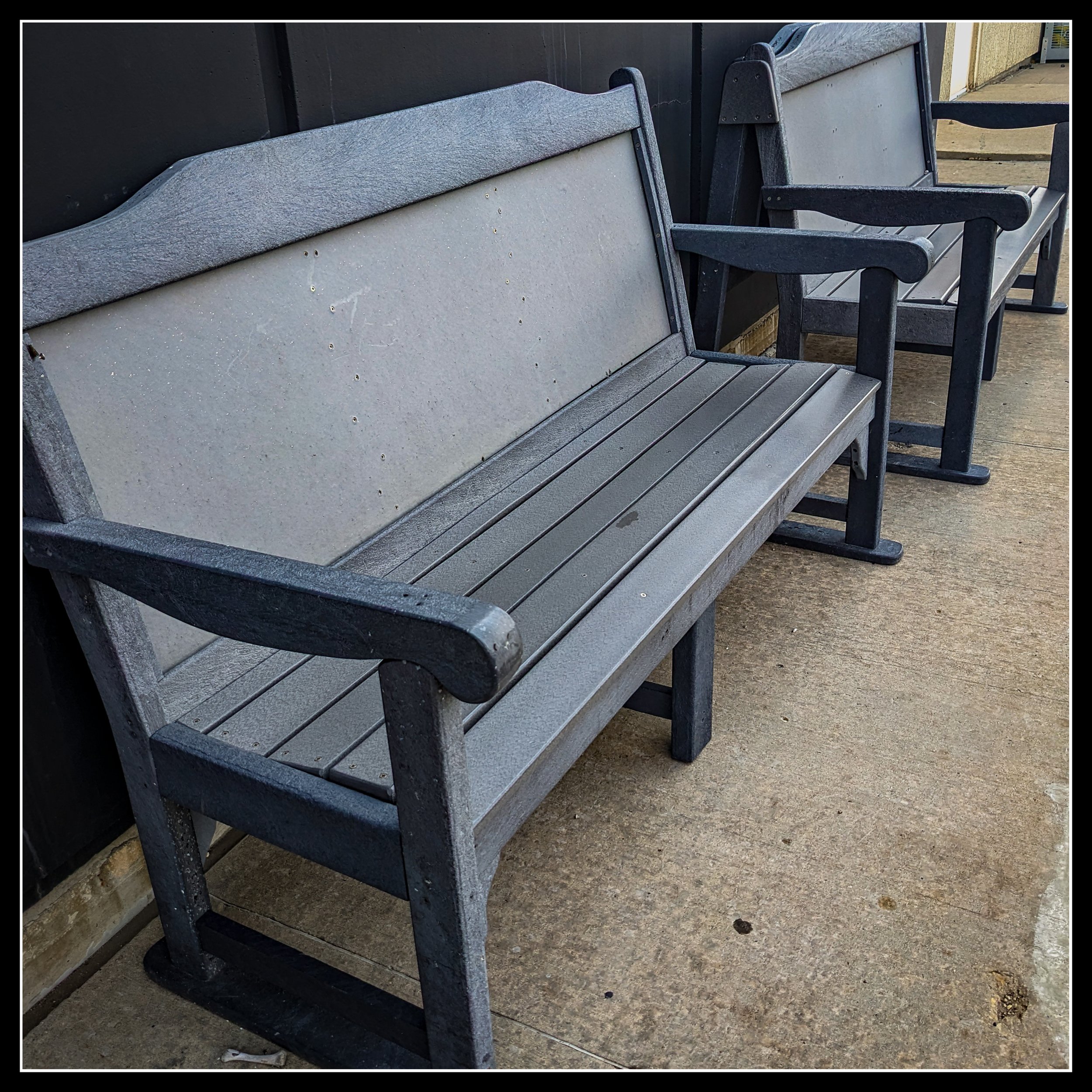 HDPE composite benches in Winnipeg, showing modern weatherproof outdoor furniture replacing traditional wood in public spaces.