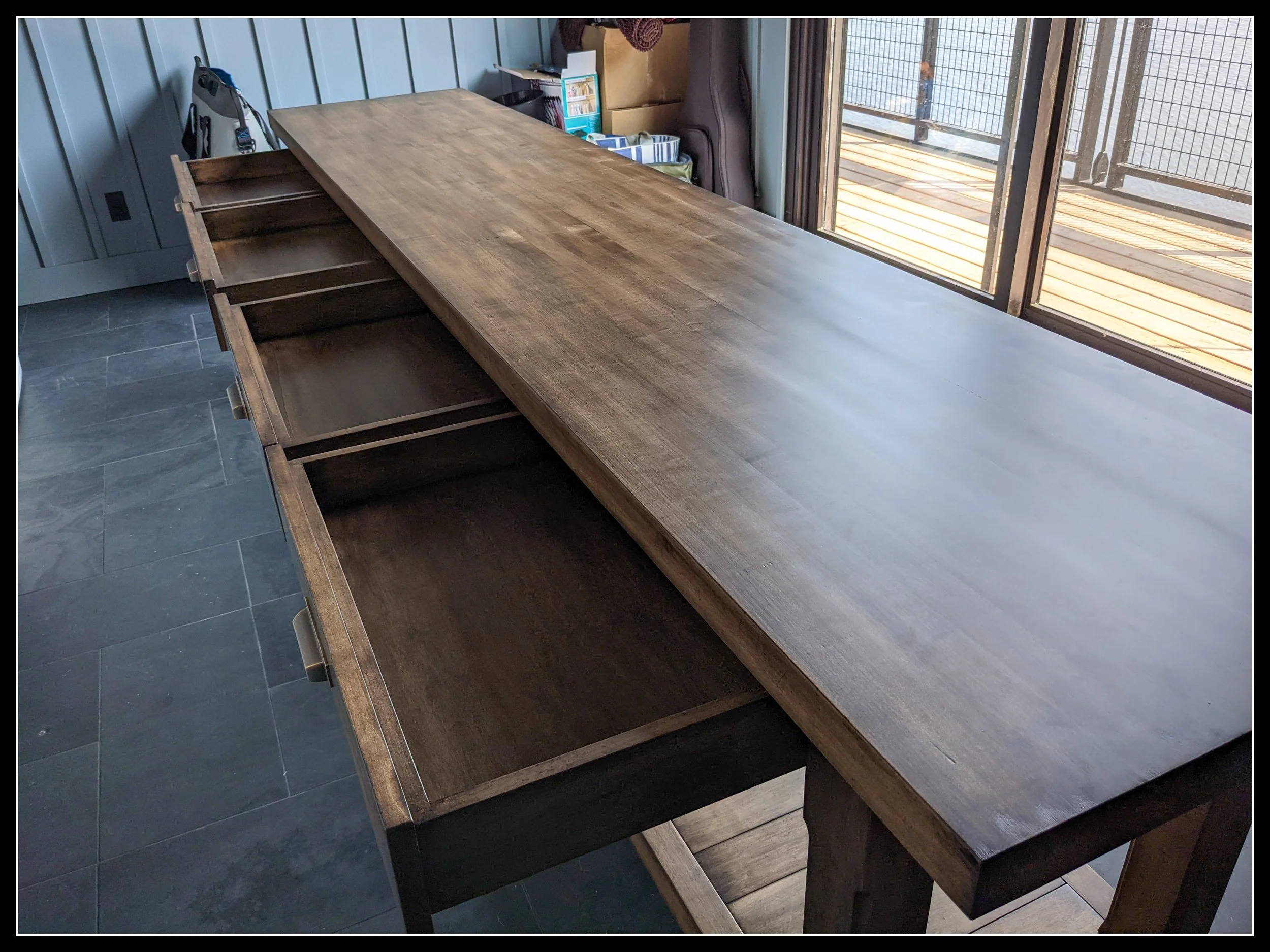 Solid maple table with matching solid maple drawer boxes, dark finish, and heirloom‑grade hardwood construction.