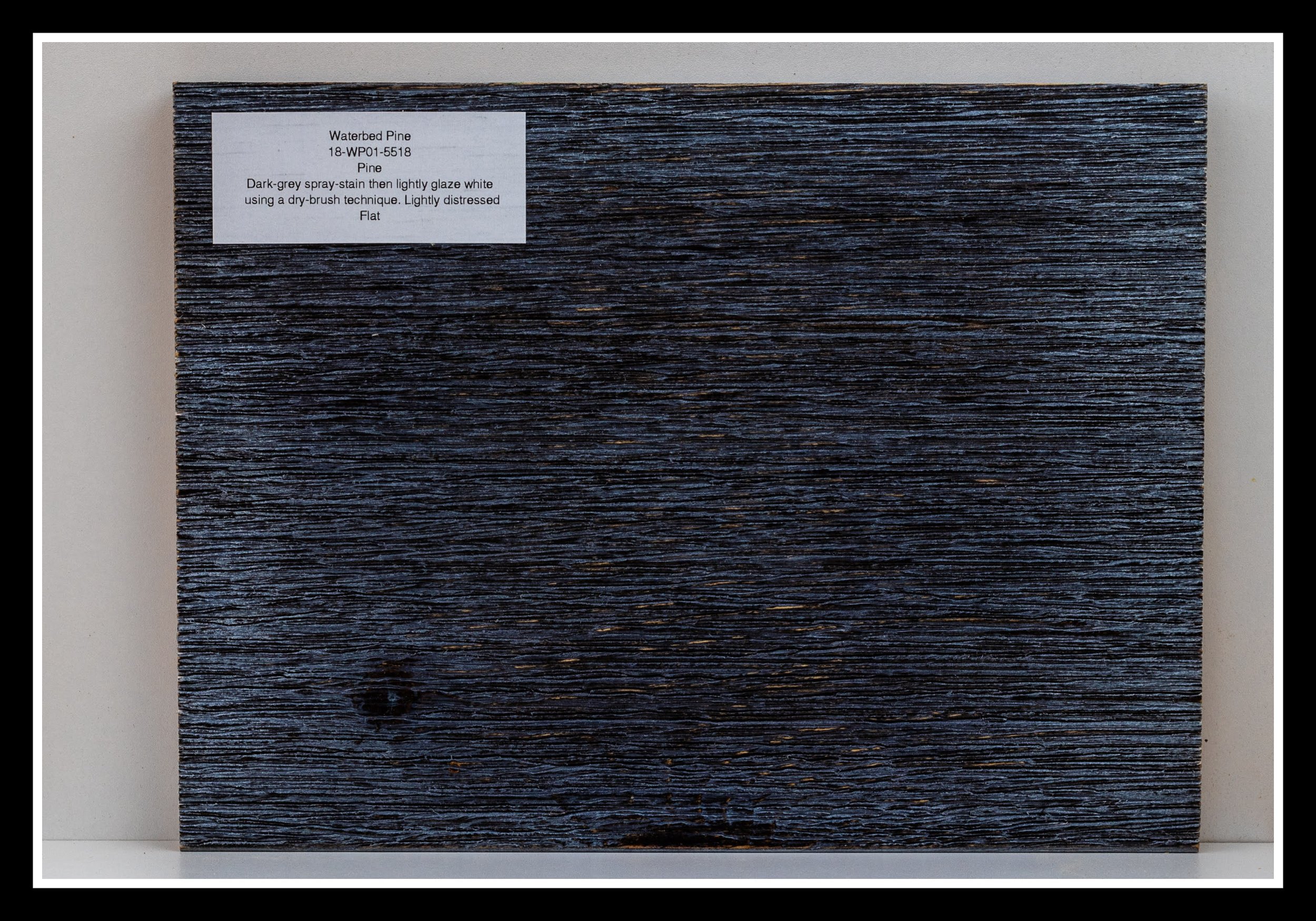Close‑up of Waterbed Pine wood grain with deep scraping, layered stain, soft glaze, brushed texture, and a 2K poly finish.