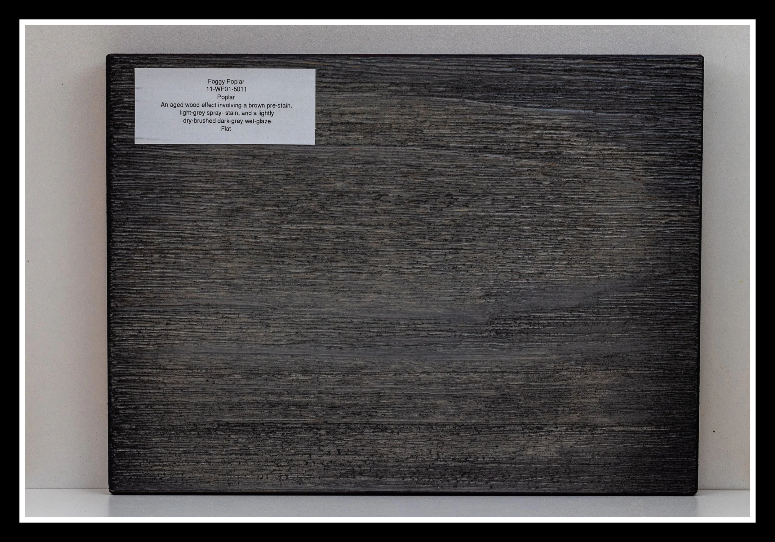 Close‑up of foggy poplar wood grain with deep scraping, brushed texture, stained and glazed layers, finished with 2K poly.