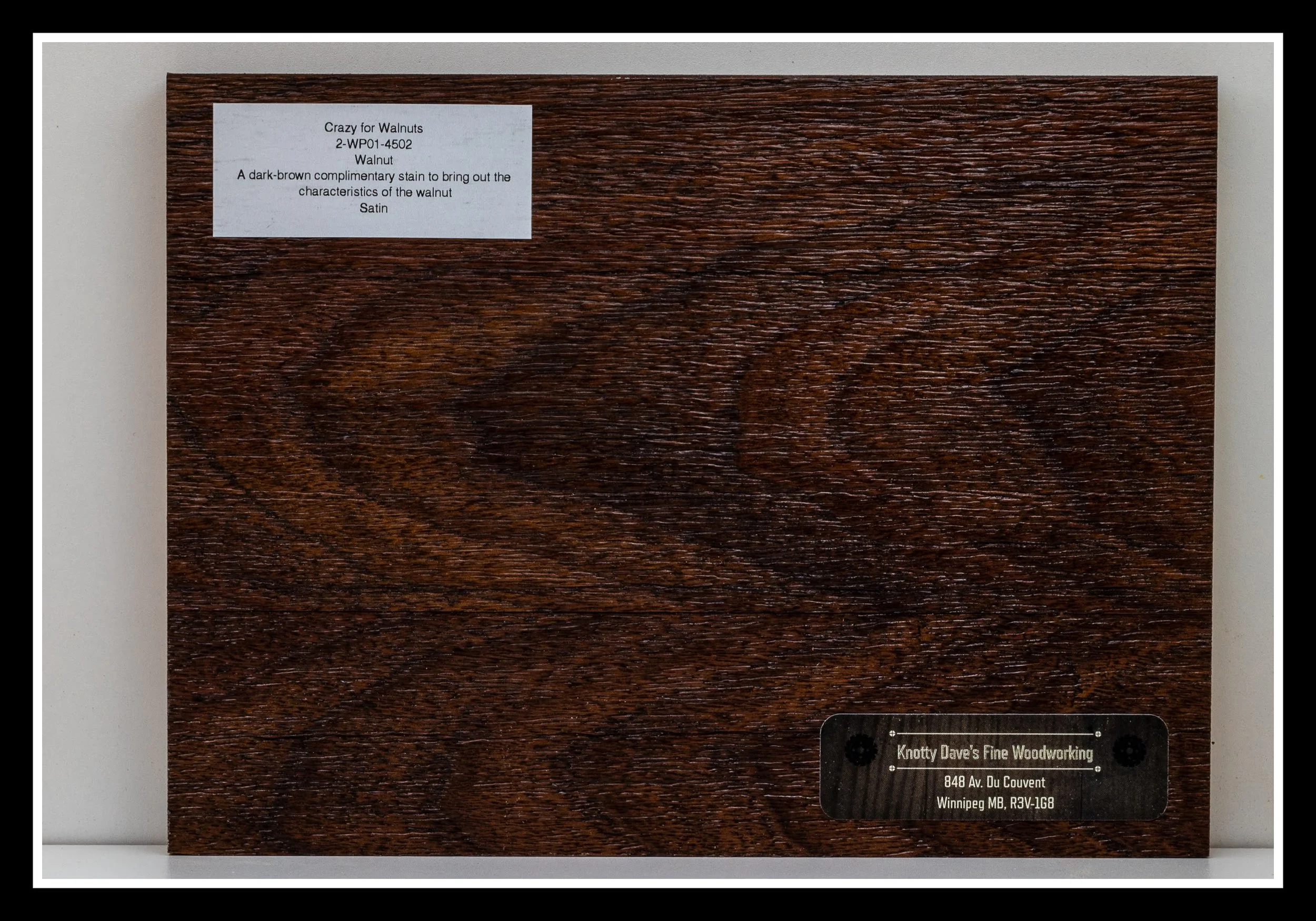Close‑up of walnut wood grain with deep scraping, dark stain, warm glaze, brushed texture, and a satin 2K poly finish.