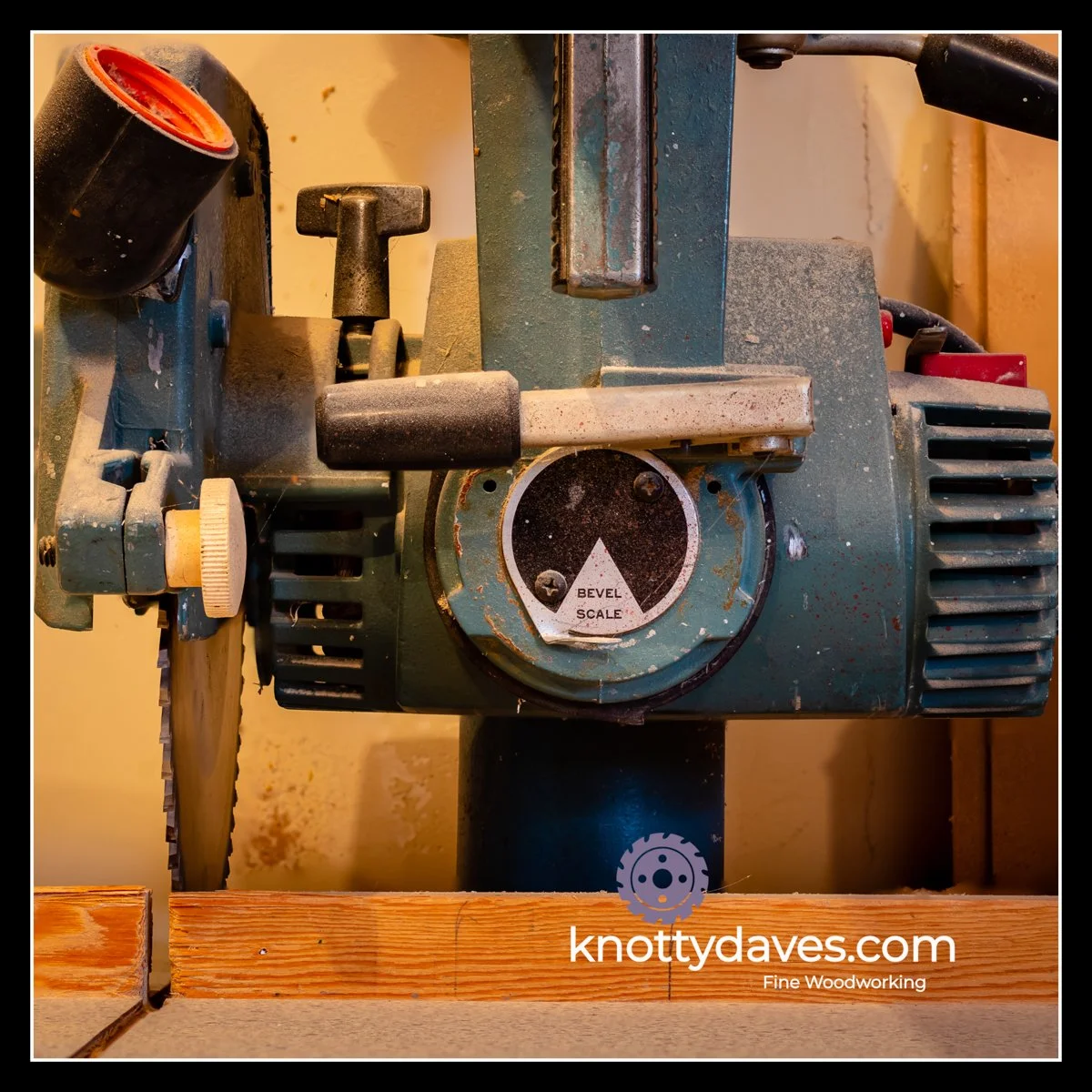 DeWalt 10-inch homeowner radial arm saw showing bent sheet‑metal levers and missing angle gauge, illustrating lighter construction compared to contractor‑grade models.