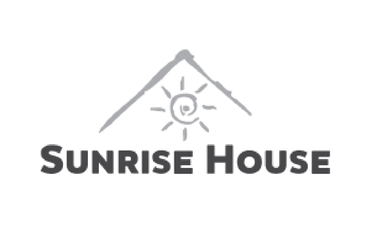 Logo for Sunrise House with a mountain outline, a sun with rays, and the text "Sunrise House".