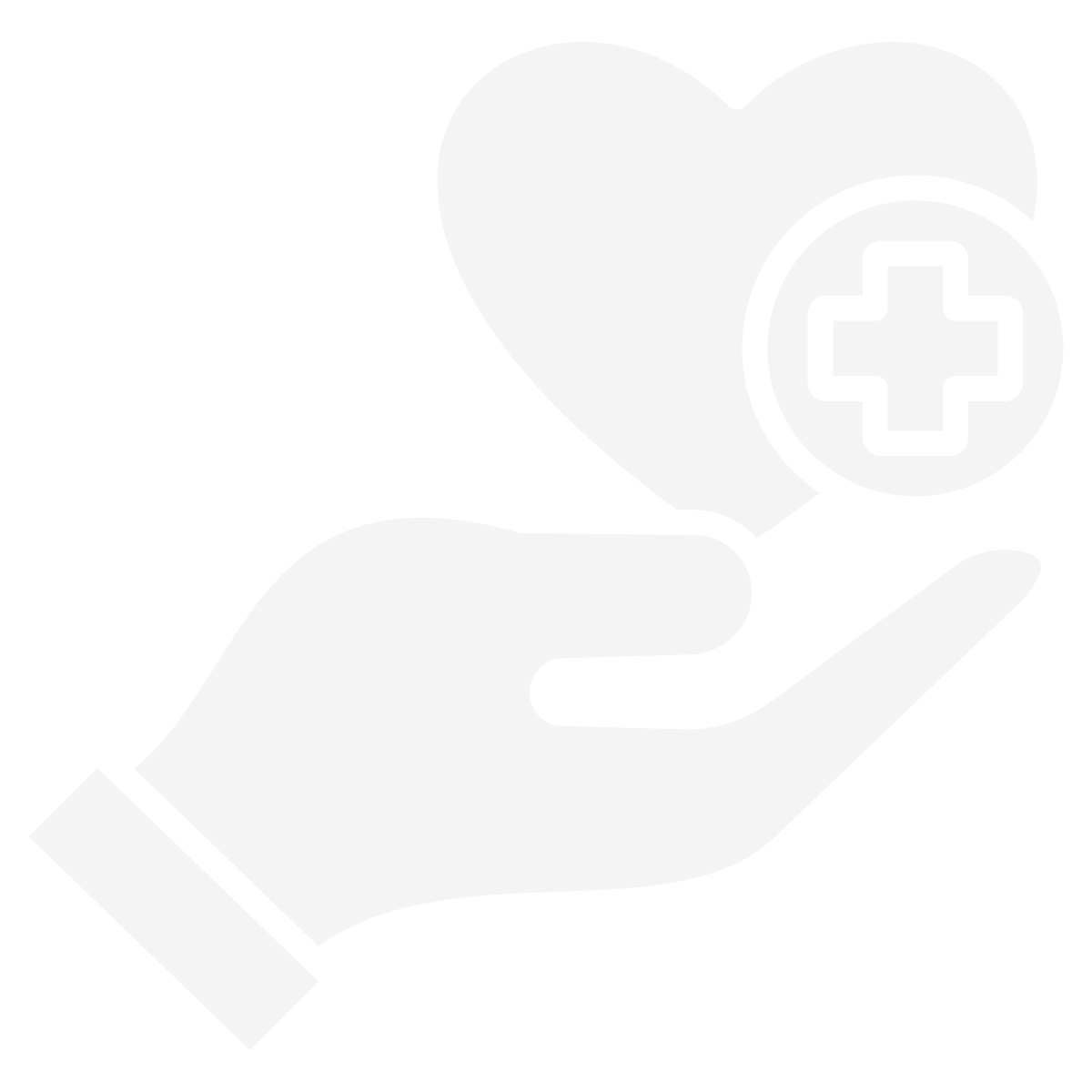 A hand holding a heart with a medical cross symbol on it.