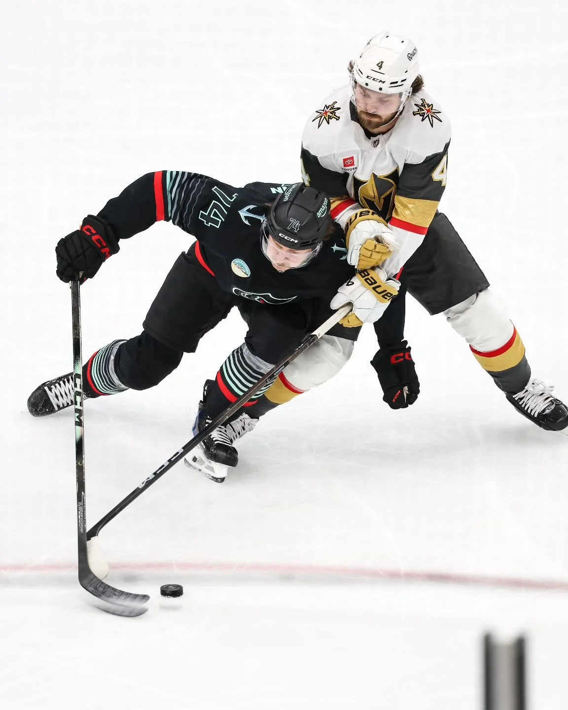 Bobby McMann (left) duels for the puck against Rasmus Andersson (right). The Vegas Golden Knights fall to the Seattle Kraken, 4-3, in a shootout on April 9, 2026.

for @circlingseattlesports

This has to be my favorite photo from last night. It was a