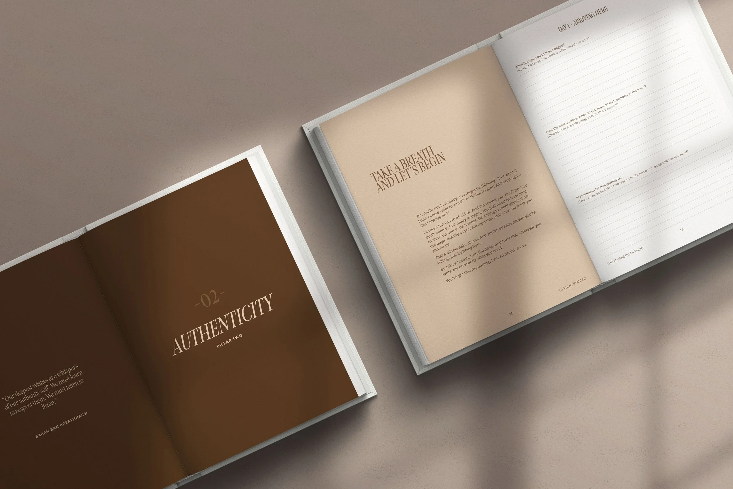 Open book with pages titled 'Authenticity' and 'Take a Breath and Let's Begin,' featuring inspirational text and lined pages for journaling, on a neutral surface.