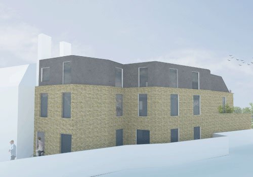 Modern multi-story building with brick and dark gray exterior, located on a snow-covered landscape with two people walking nearby and a cloudy sky.