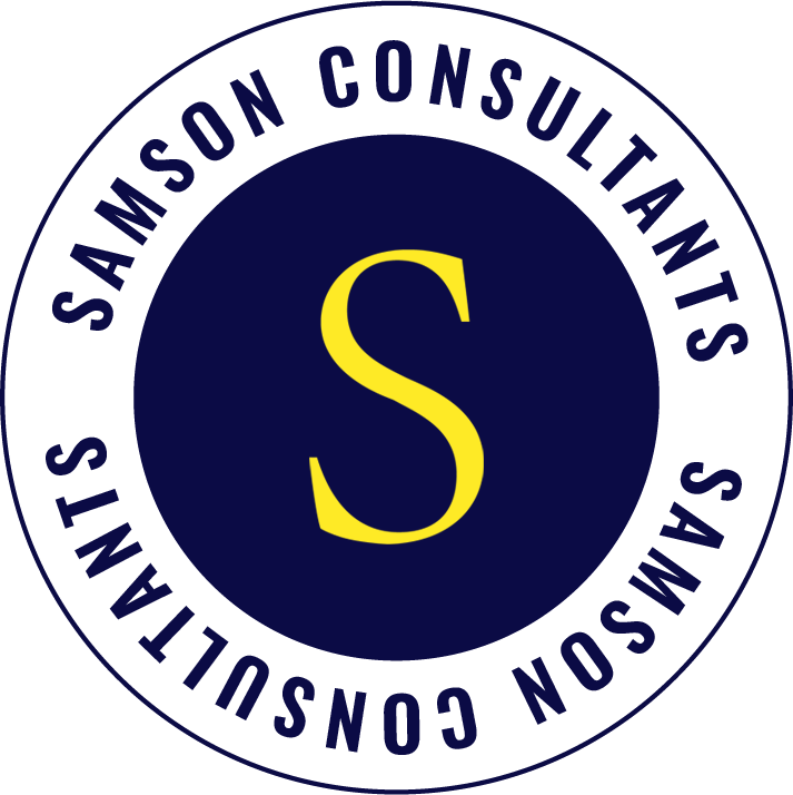 Logo for Samson Consultants featuring a navy blue circle with a large yellow letter S in the center, surrounded by the text 'SAMSON CONSULTANTS' repeated twice in uppercase navy blue letters.
