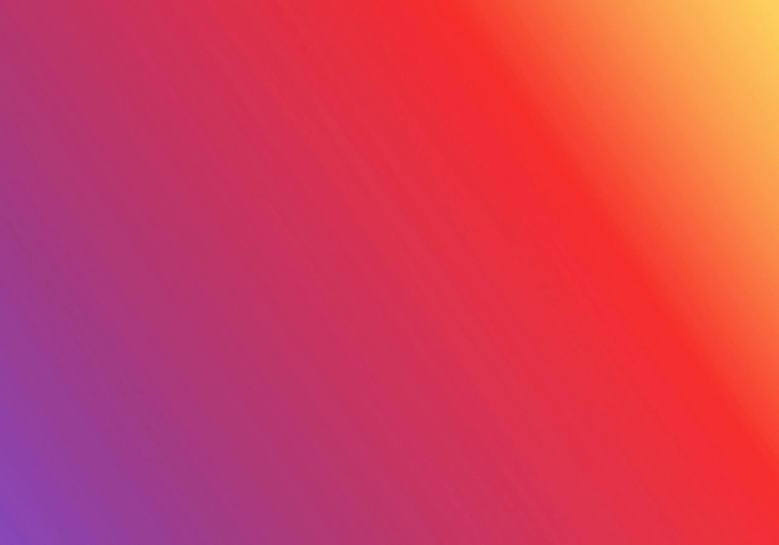 Blurred gradient background with colors purple, pink, red, orange, and yellow