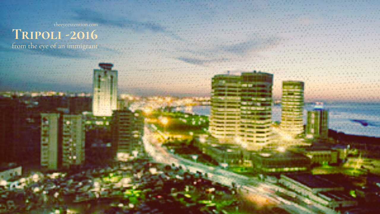Tripoli coastline at dusk in 2016, city lights facing the Mediterranean Sea