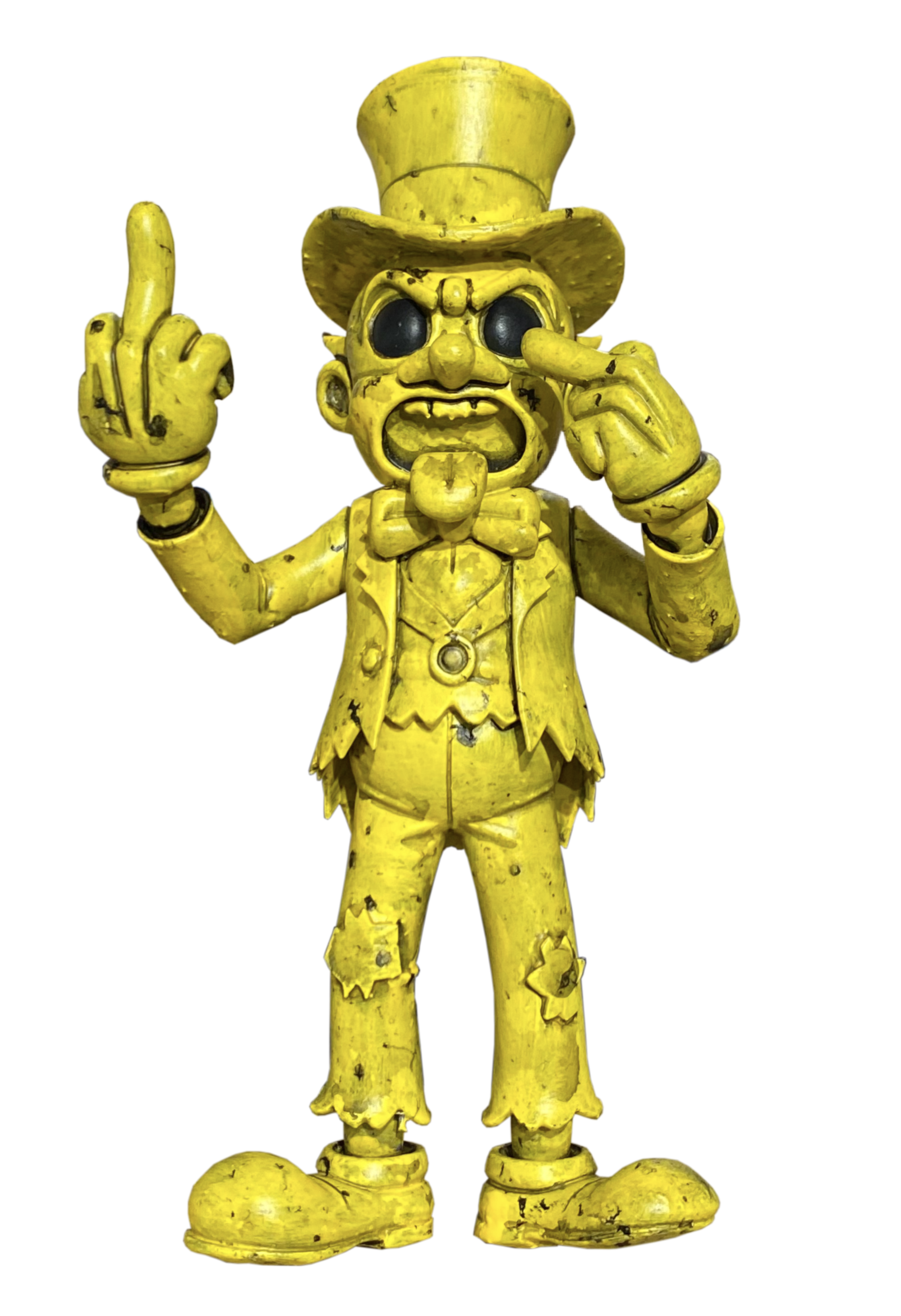 A yellow, weathered statue of a cartoonish character wearing a top hat, bow tie, and suit, making a rude hand gesture with both hands.