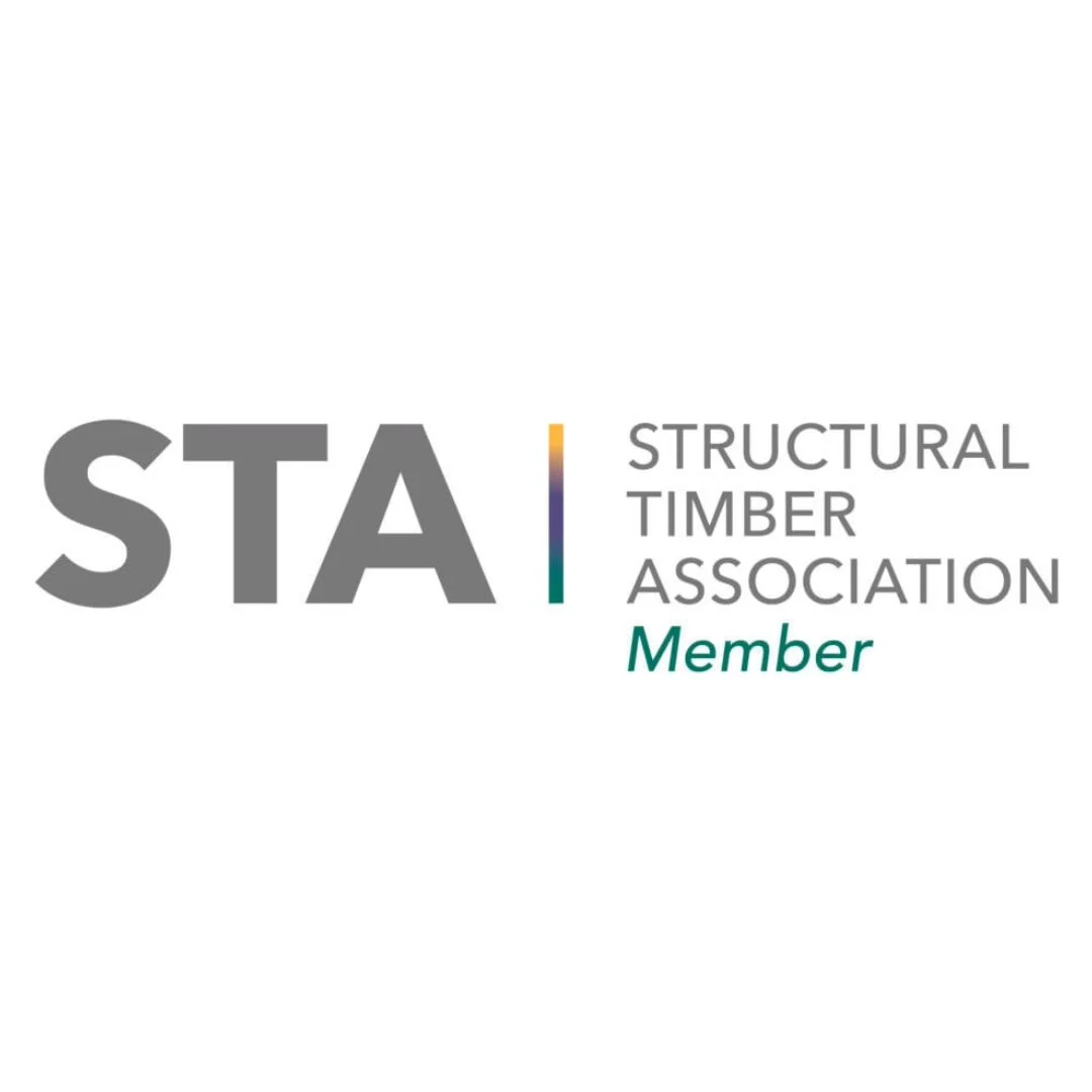 Logo of the Structural Timber Association with the acronym STA in large gray letters, a vertical rainbow-colored line beside it, and the words 'Structural Timber Association' with 'Member' in green below.