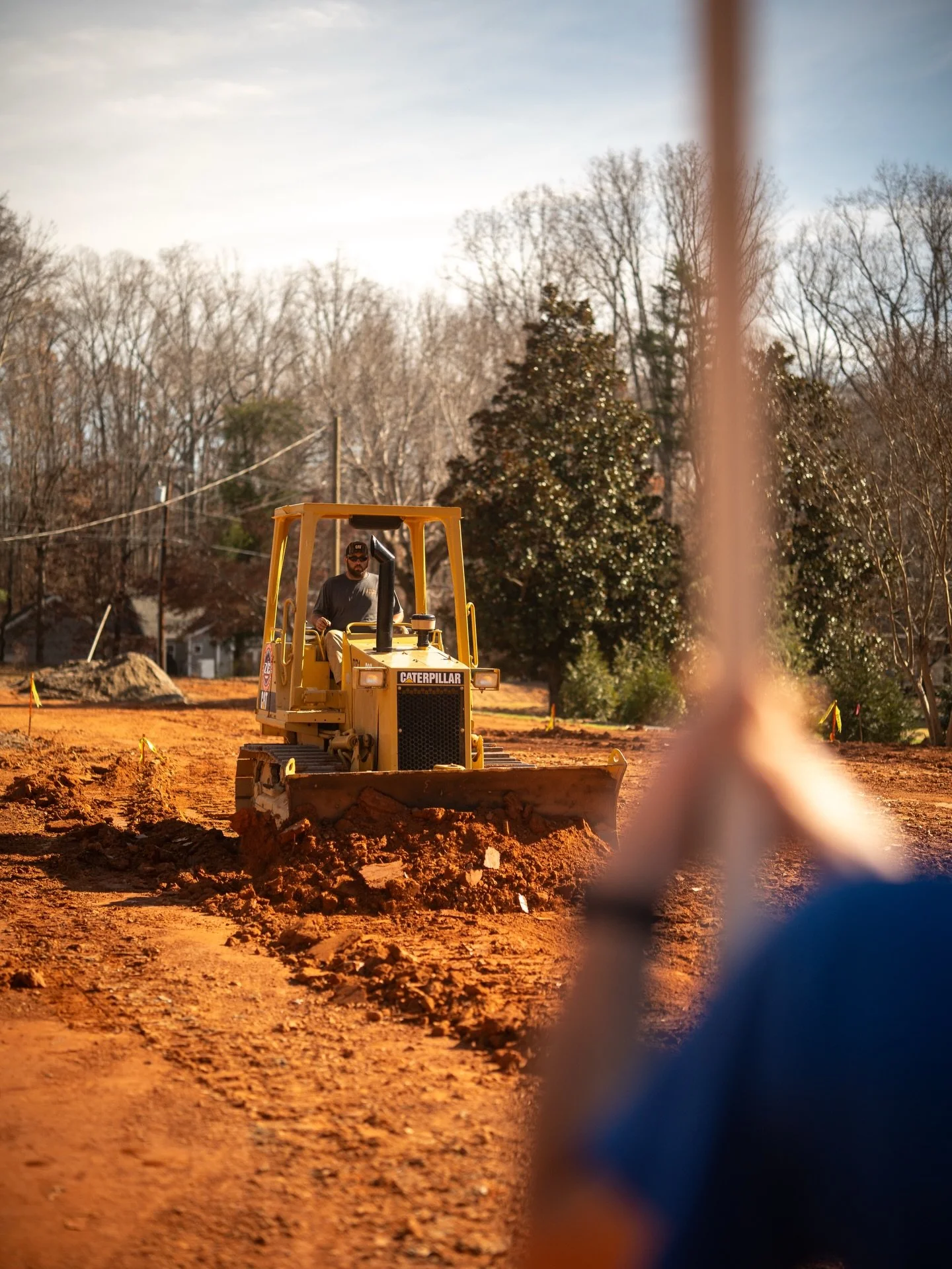 Nobody moves dirt like we do.

At ZC Grading, this is where we&rsquo;re at home &mdash; boots in the red clay, eyes on grade, and machines pushing every inch exactly where it needs to go. Precision isn&rsquo;t optional for us. It&rsquo;s the standard