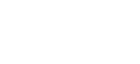 The word 'QUAD' in bold black letters on a black and white background.