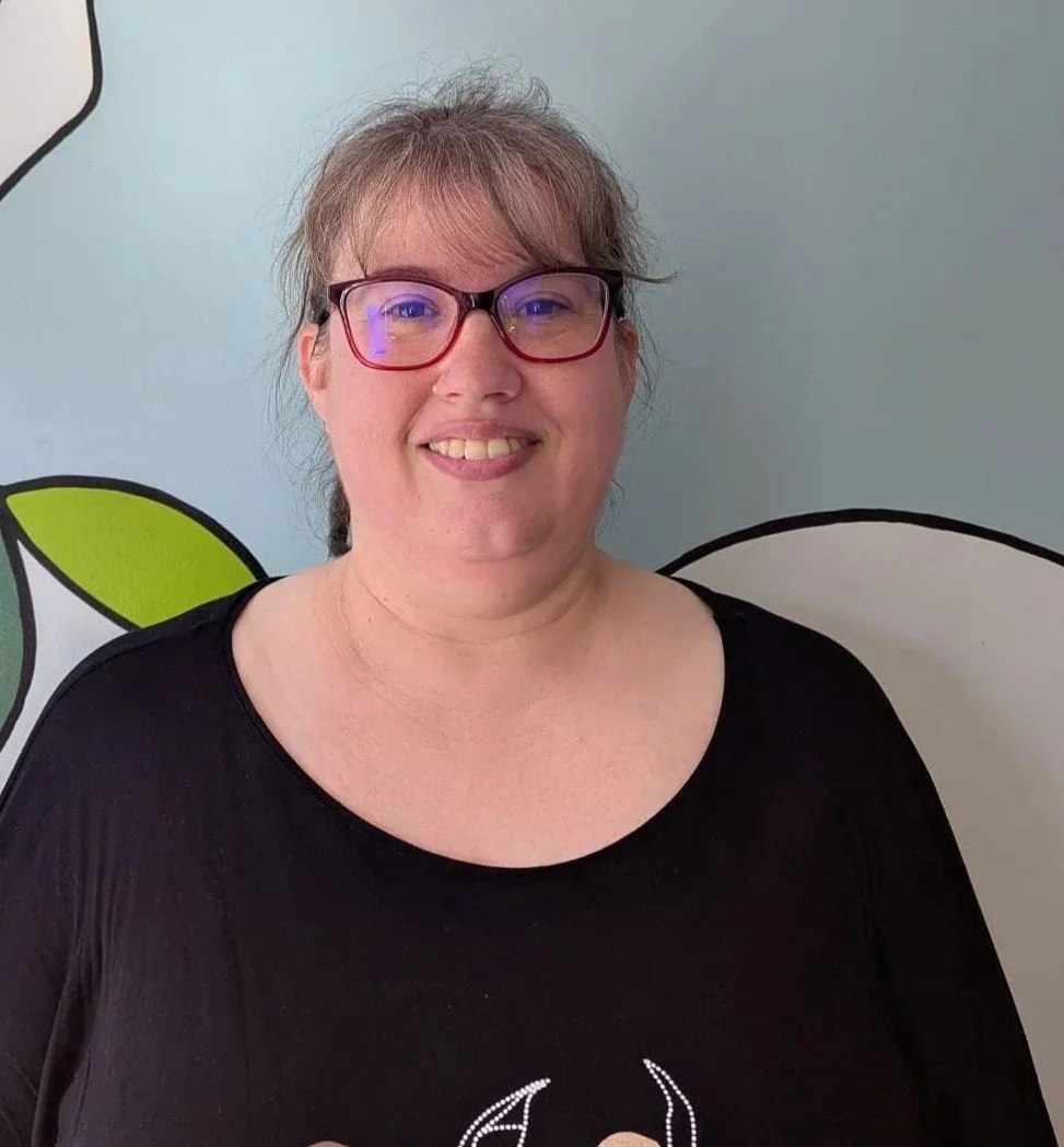 Smiling lady with glasses