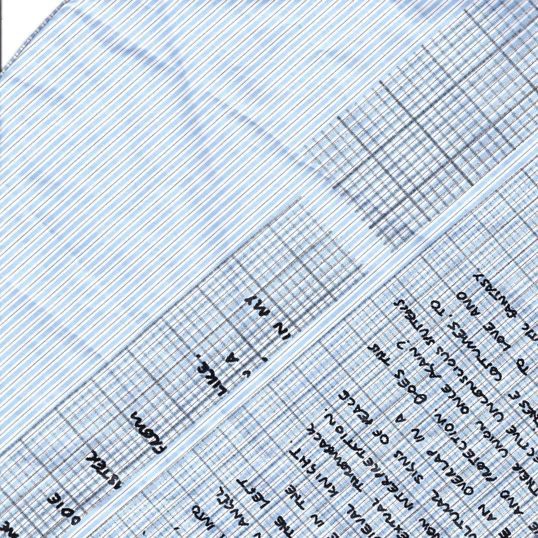 Close-up of two graphs with grid lines, containing handwritten notes and annotations on graph paper.