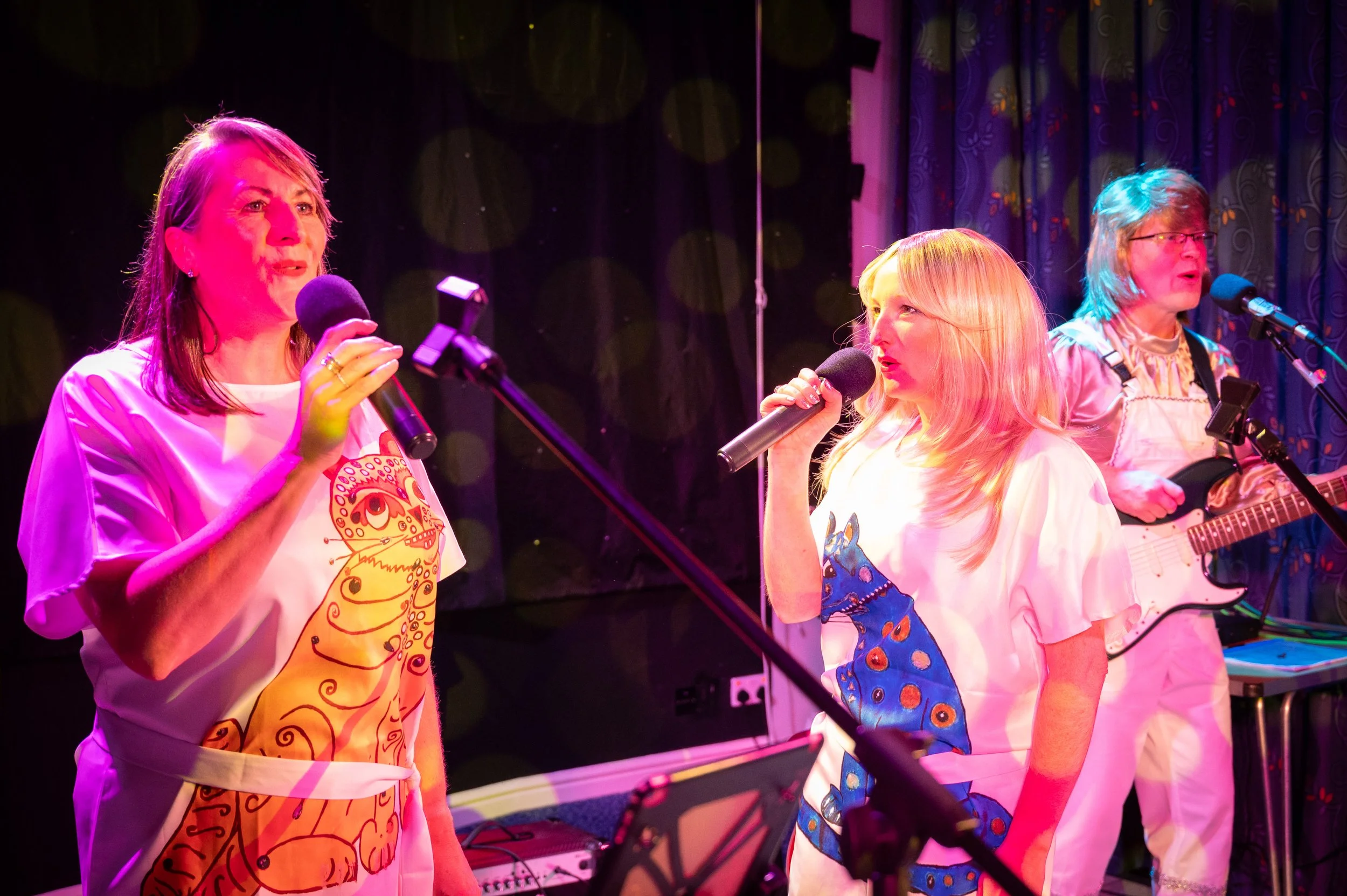 Take A Chance On 3 performing ABBA song Mamma Mia live in Milton Keynes in November 2025, as part of their ABBA tribute act.