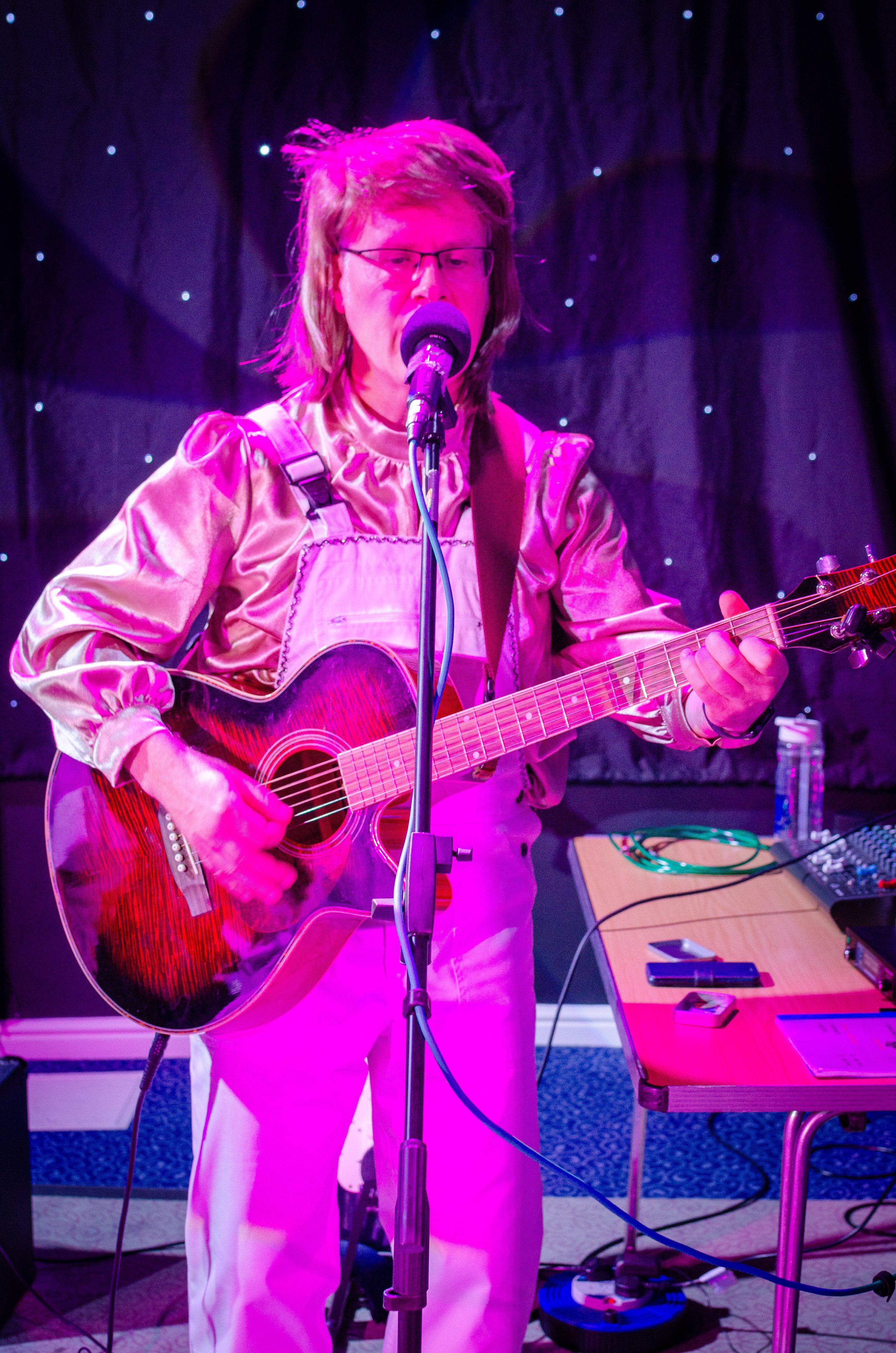 Take A Chance On 3 performing ABBA song One Of Us live in Milton Keynes in November 2025, as part of their ABBA tribute act.