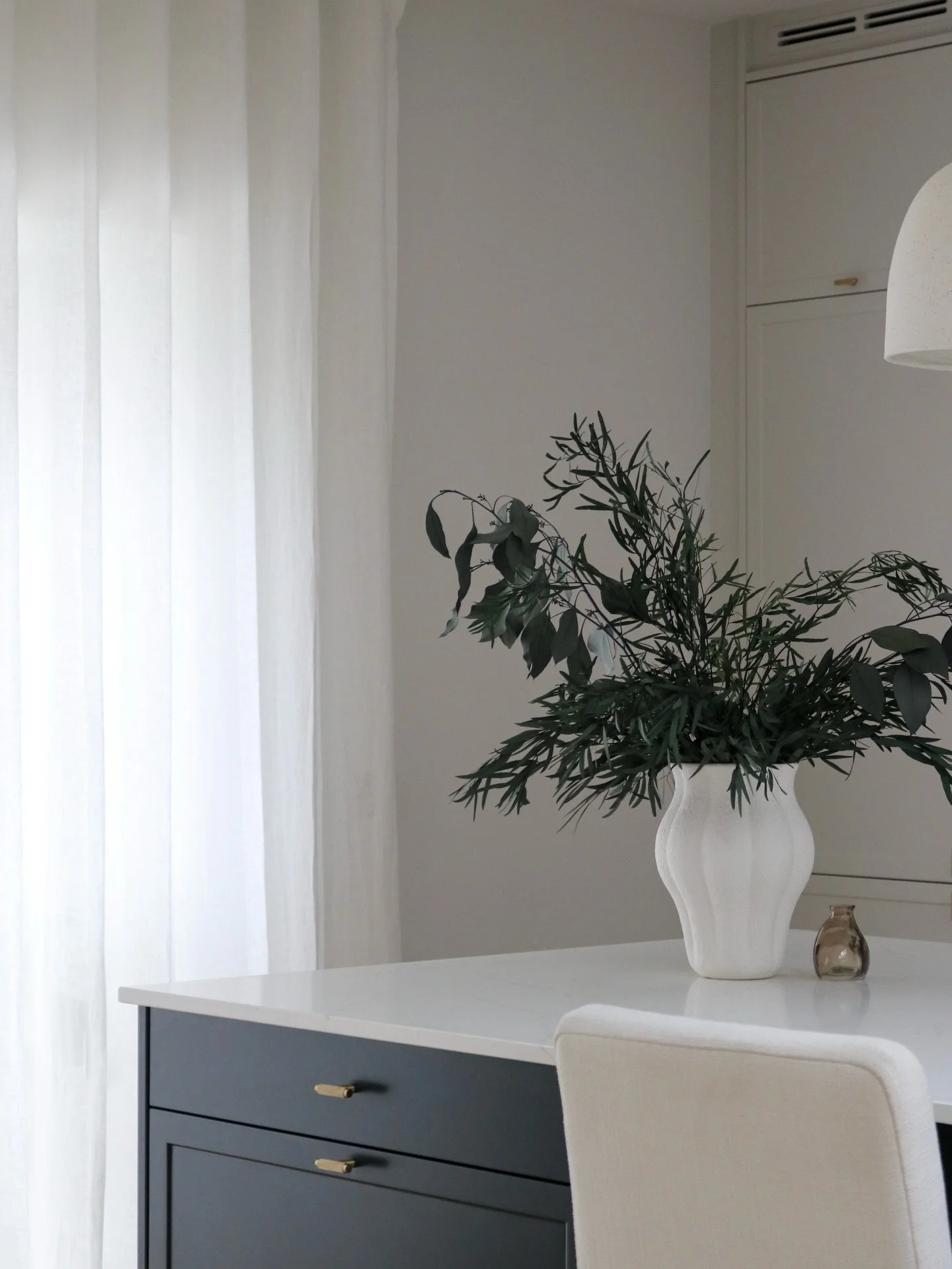 V is for vases.

One of the simplest ways to bring a sense of life into a space. A vase, whether filled with fresh greenery or something more sculptural, can gently shift how a room feels.

It adds an organic layer. Softens the edges. Brings a quiet 