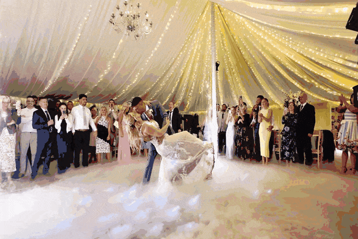 First dance with cold sparks and 'dancing on the clouds' dry ice in the Parley Manor wedding marquee